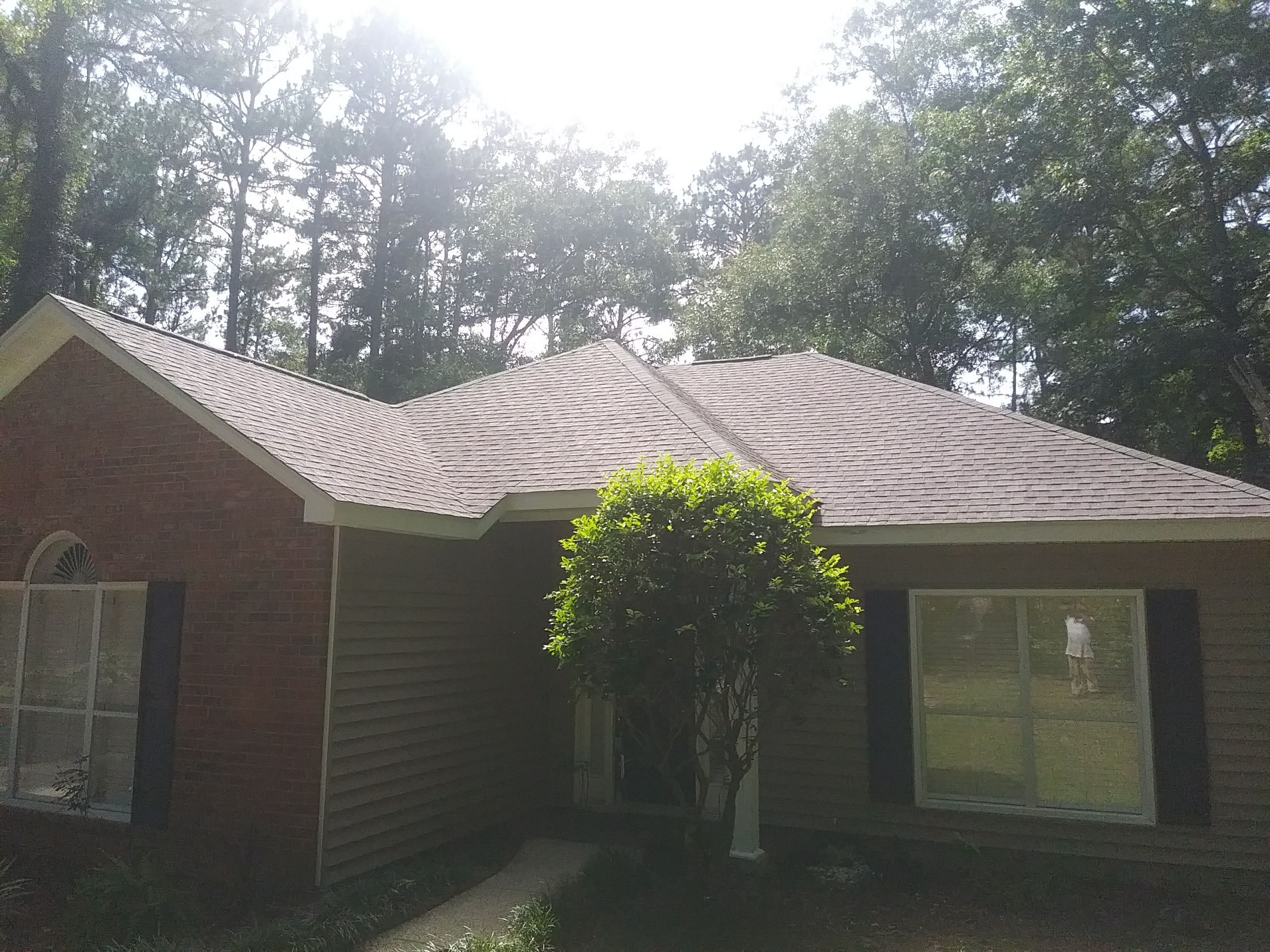 Residential Roofing Installation using Roof Replacement by American Roofing & Construction LLC