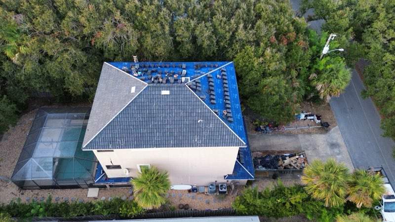 Flagler Beach Residential Tile Roof Replacement with Dark Barrel Tiles by Fortified Roofing Solutions Corp.