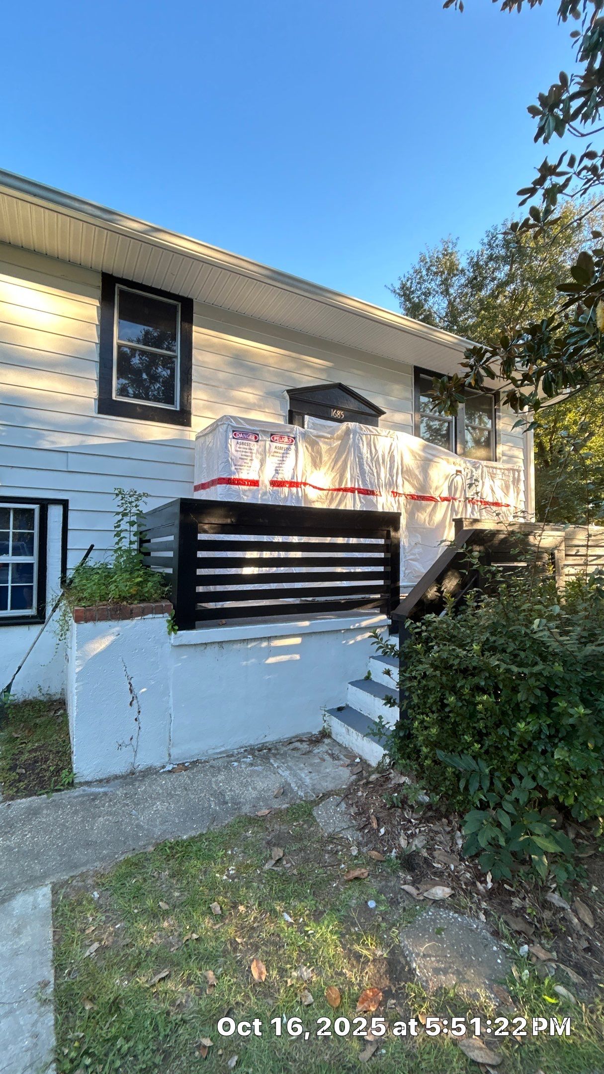 Friable asbestos ceiling abatement with air monitoring by EAS Environmental, LLC.