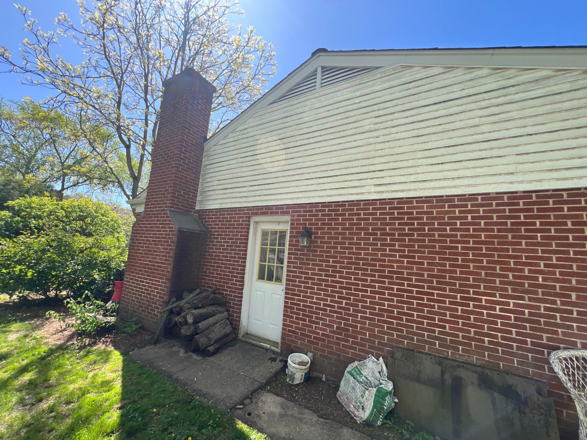 Housewashing  using Algaecide, soft wash soap by Northern Power Washing LLC.