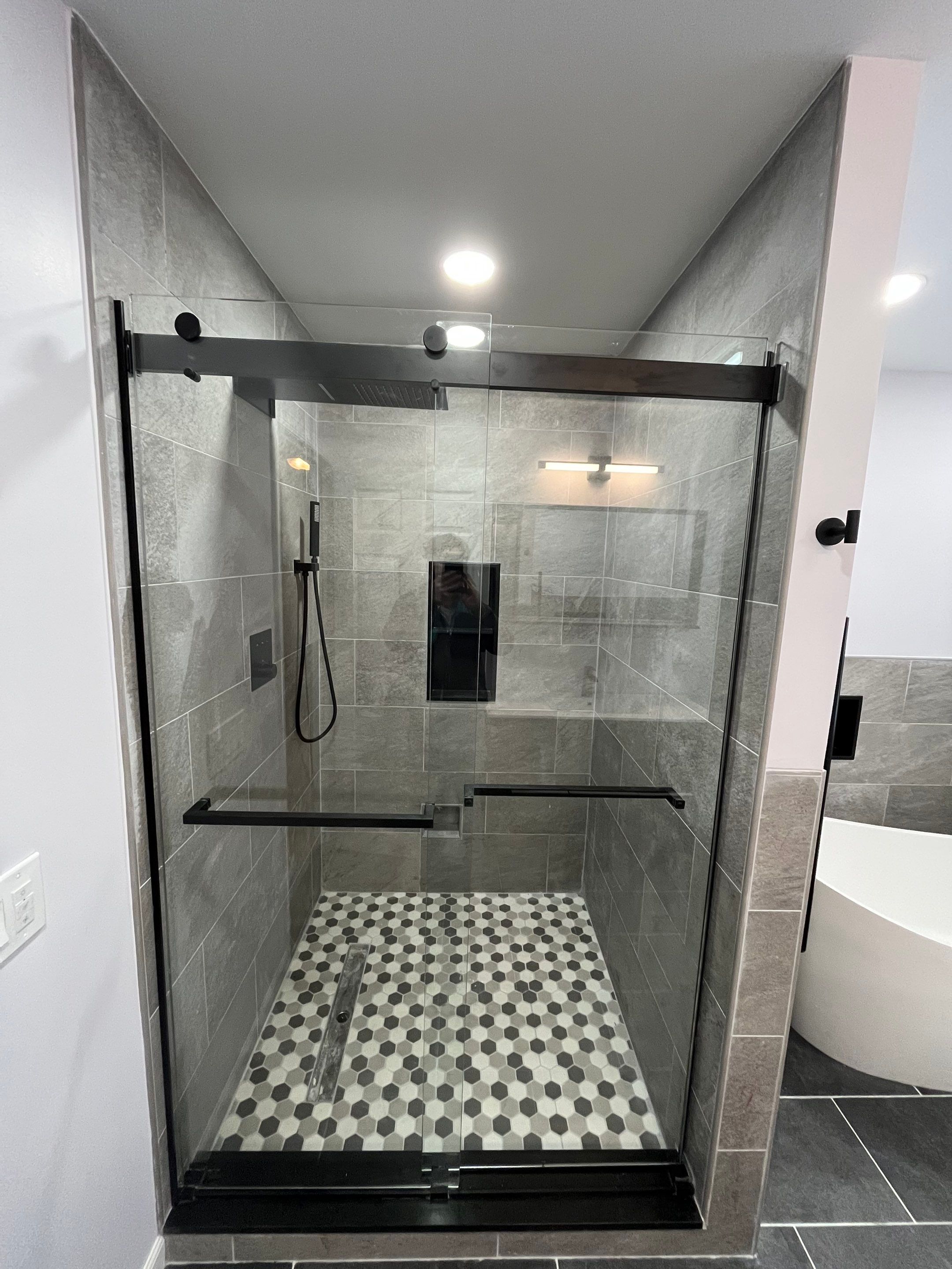 Bathroom Remodel using Tile by Home Concepts Construction