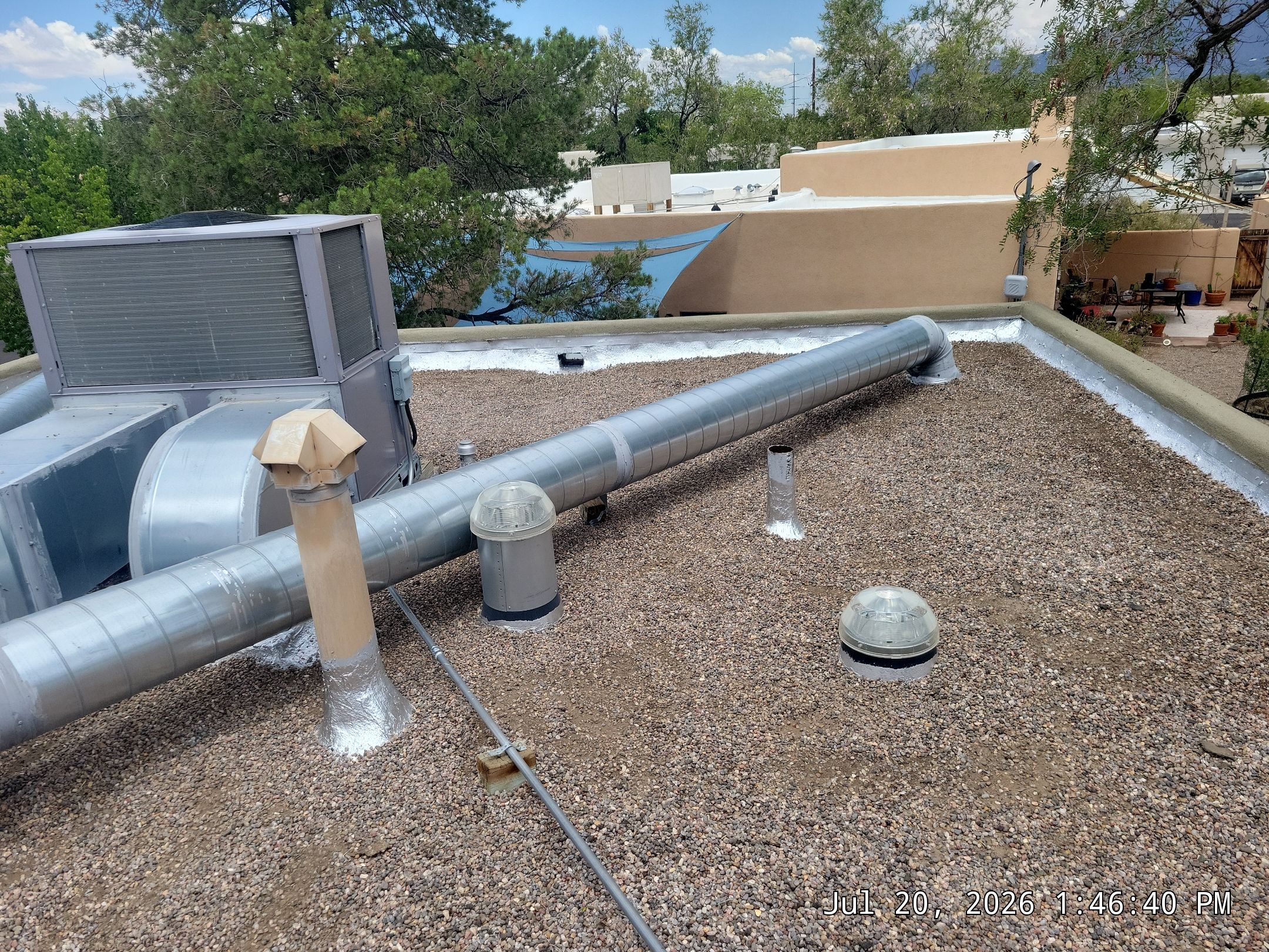 Tar and Gravel Roof Maintenance and Penetration Sealing in Albuquerque by Doyle Roof Masters Inc