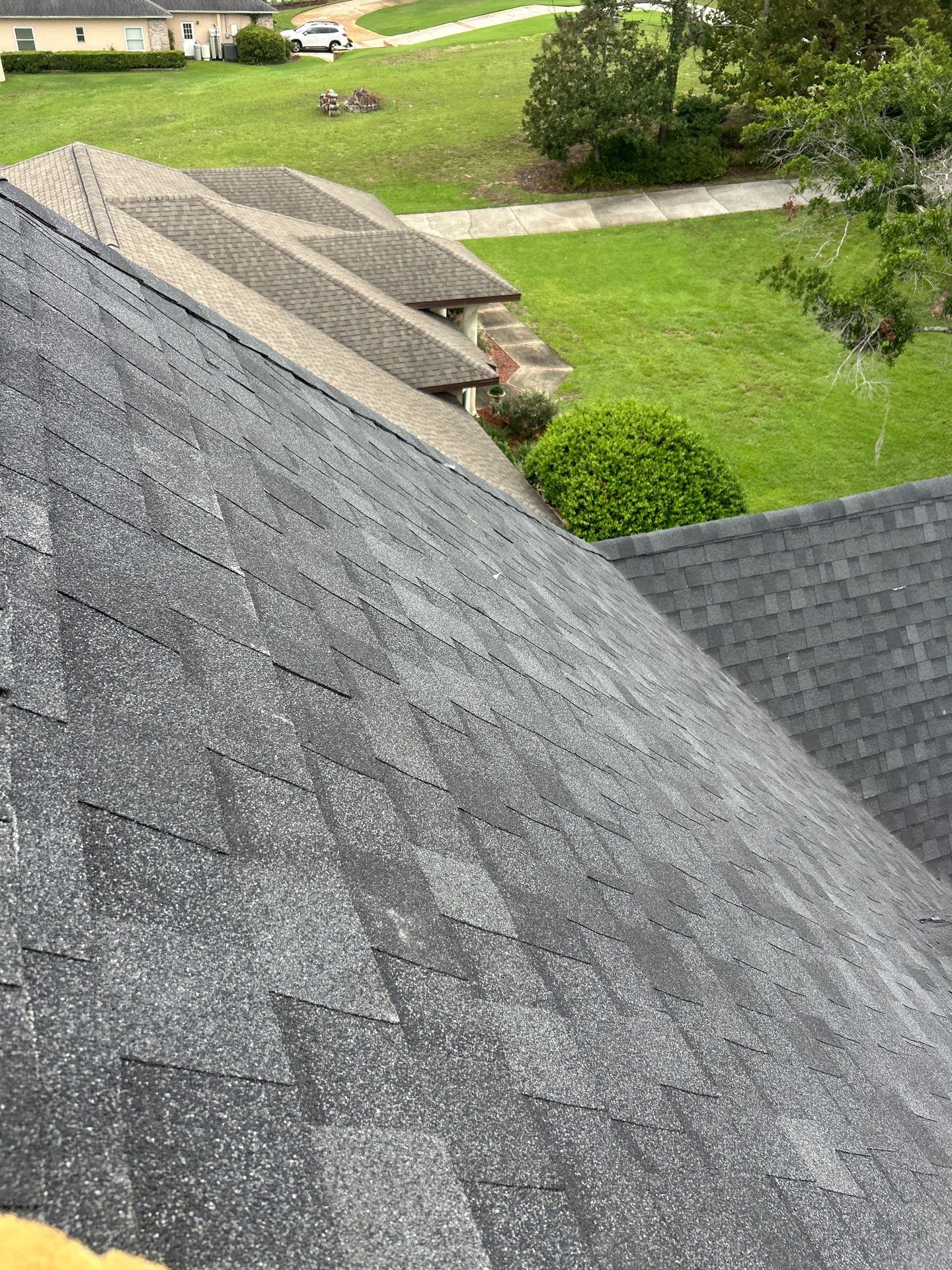 Residential Roofing Installation with Black Shadow Shingles in Clermont by Pinnacle Roofing Group