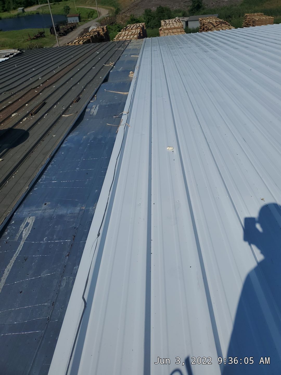 Commercial Roofing Installation using Aluminum Roofing panels by Hostetler Roofing