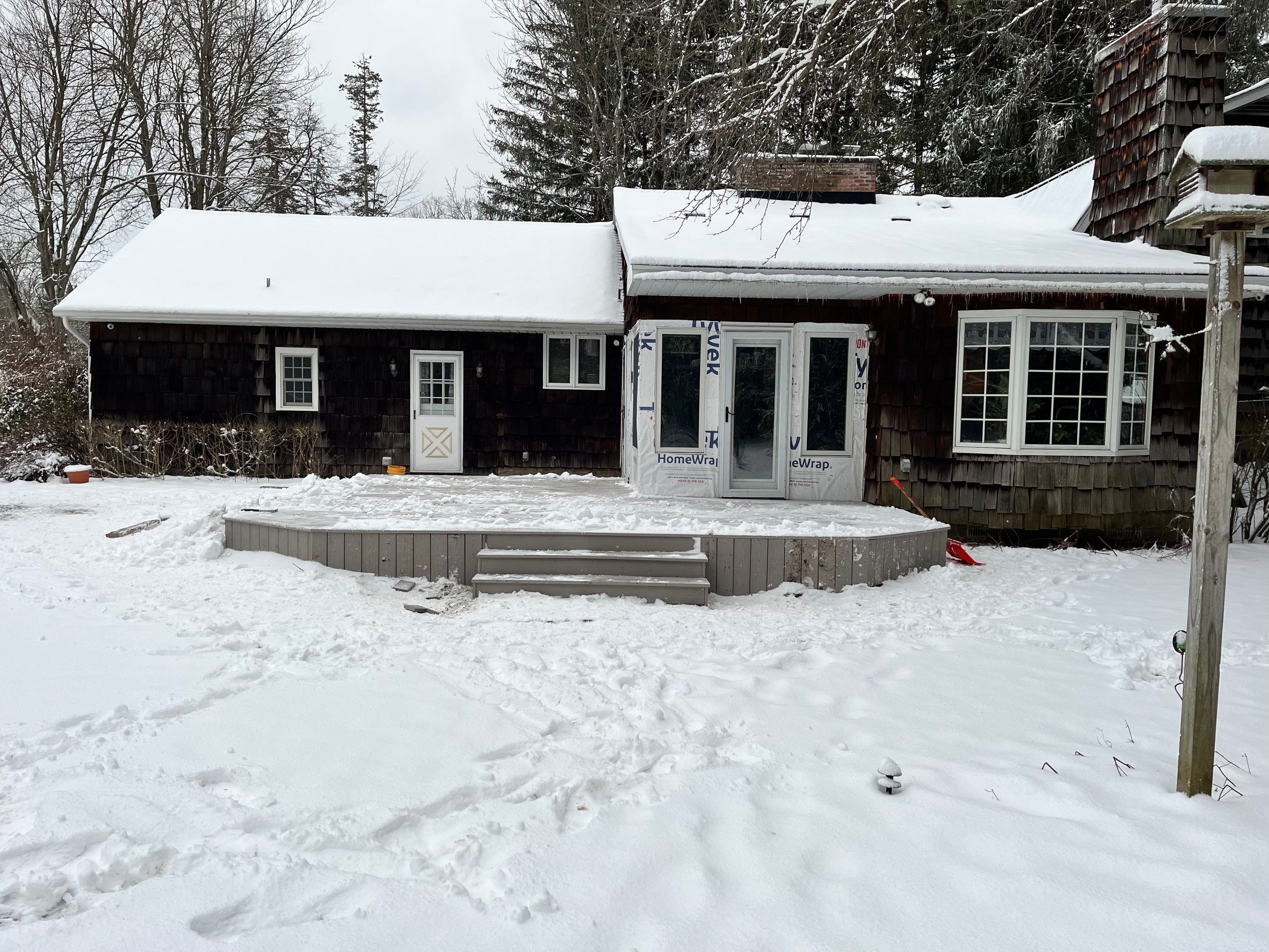 Deck and Stamped Concrete by Ivy Lea Construction
