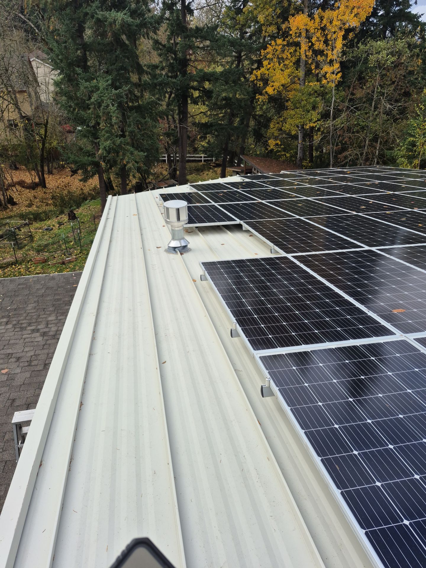 New Metal Roof and replace solar panels by Hawthorne General Construction