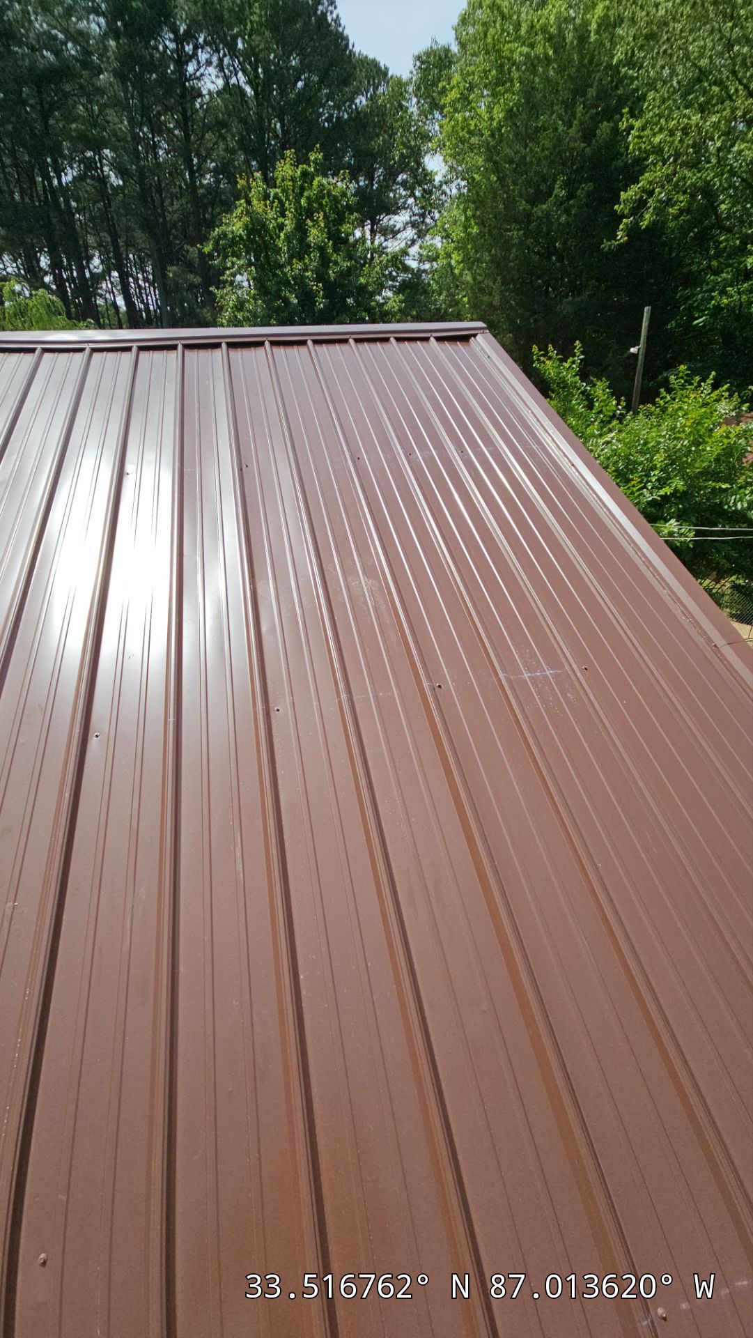Metal Roof Replacement in Sylvan Springs (Brown) by The Roofing Dudes