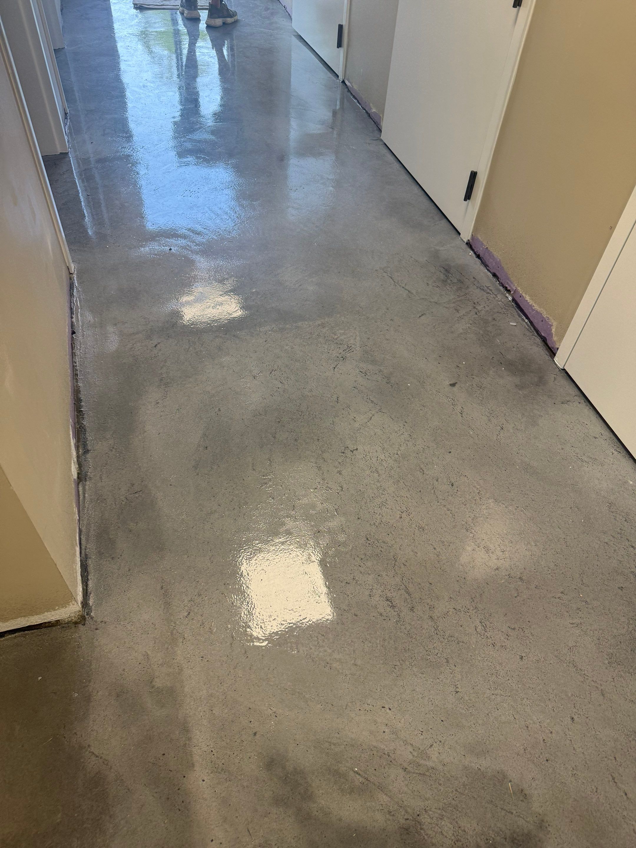 Industrial Epoxy Flake and Concrete Overlay Floor Installation in Pensacola by Cornerstone Hard Surface Restoration