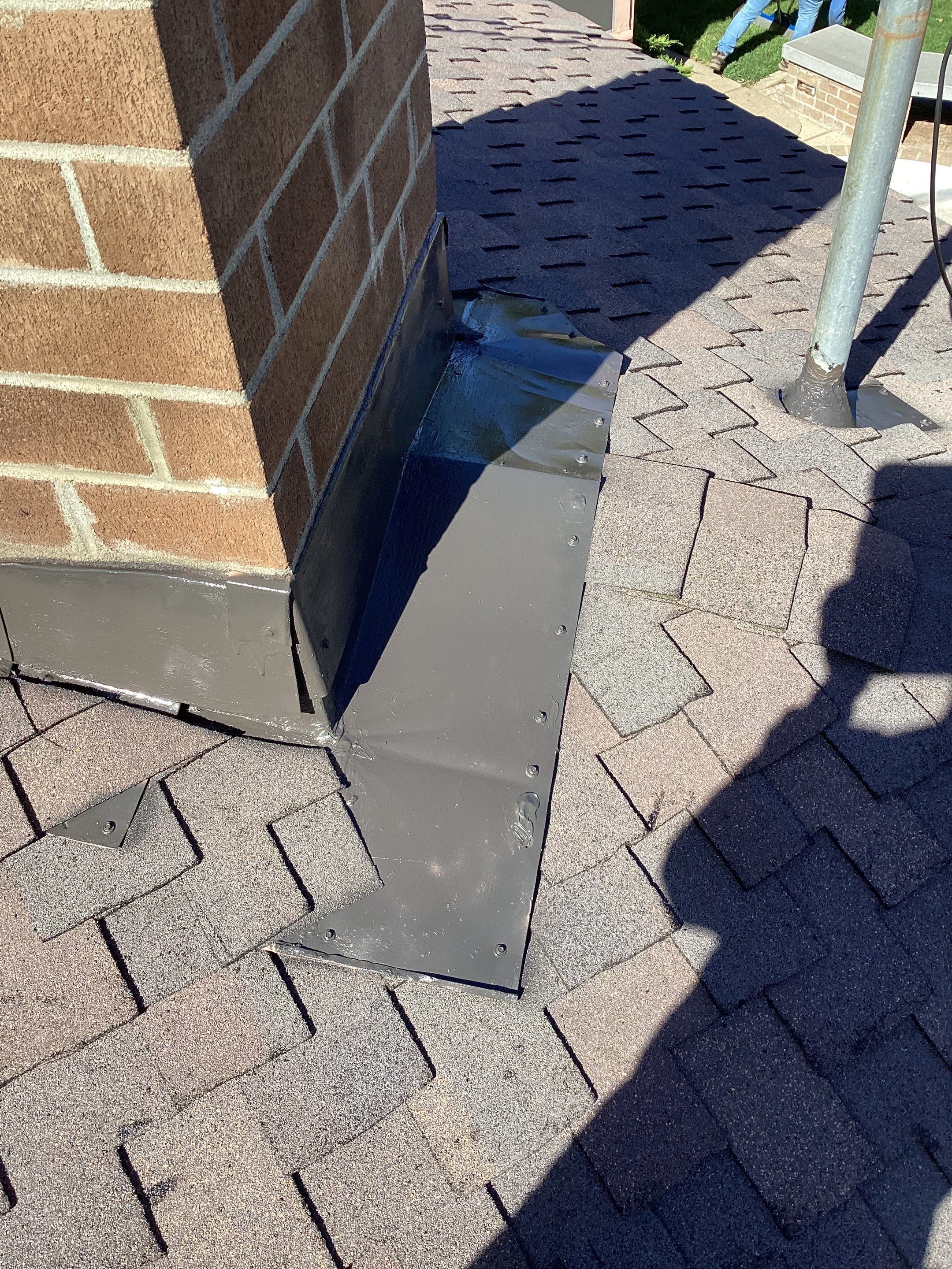 Installation of Certainteed Presidential shingles on residential house by Straight Edge Roofing Inc