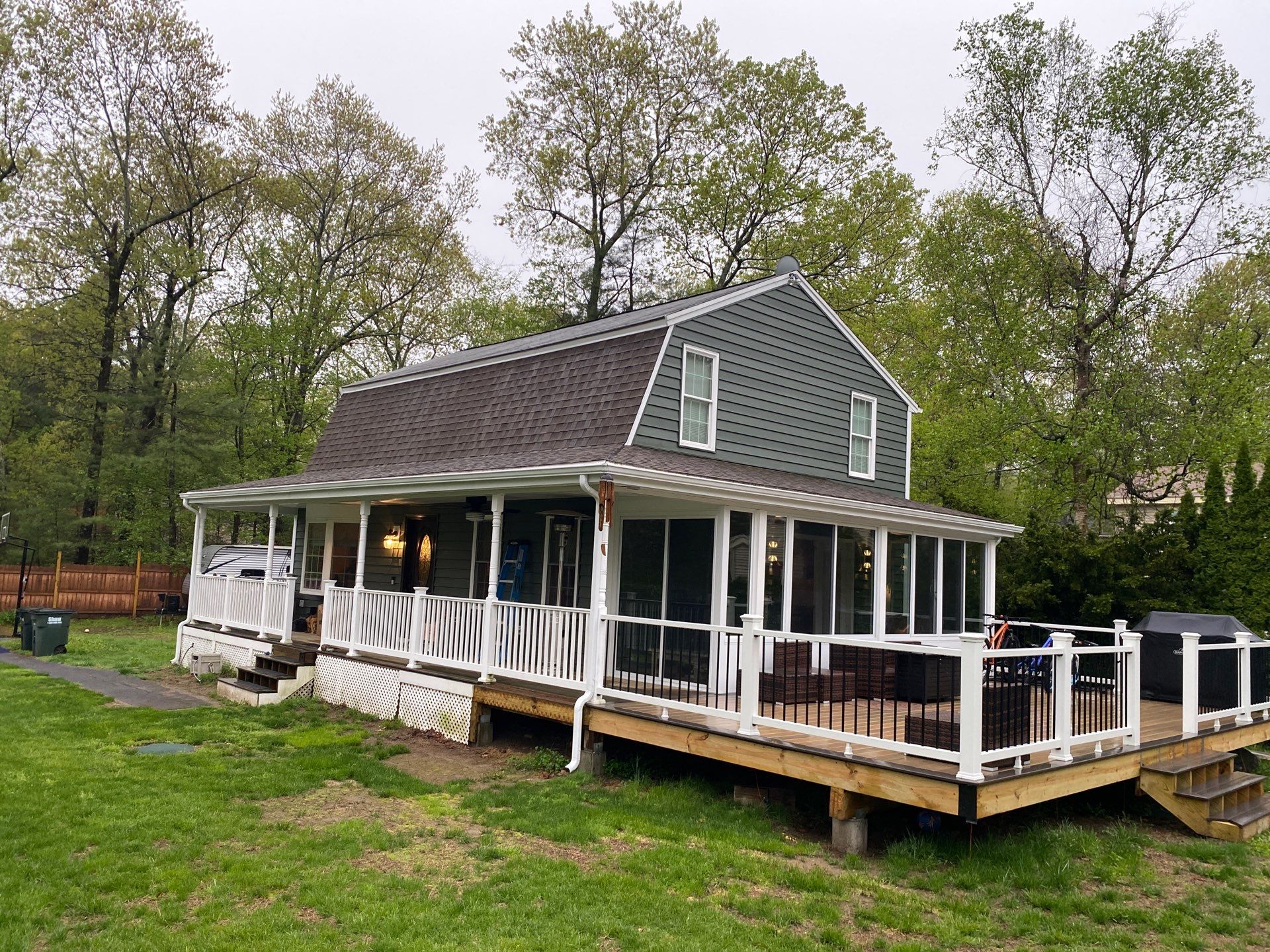 Full Roof Replacement & Farmers Porch Restoration – Asphalt + Standing Seam Metal by Mighty Dog Roofing of Greater Middlesex County