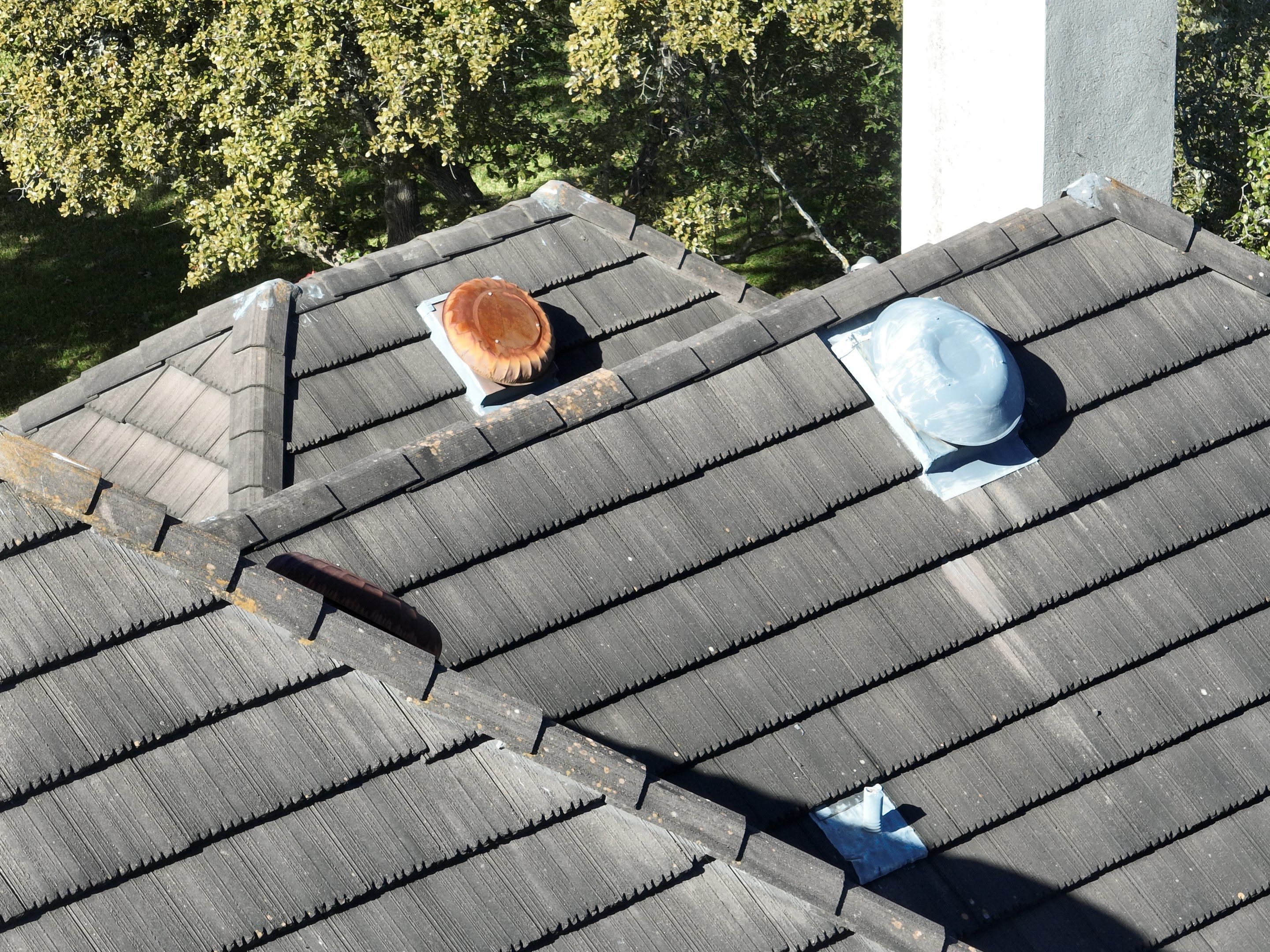 Tile Roof Repair  by Premier Roofing and Contracting