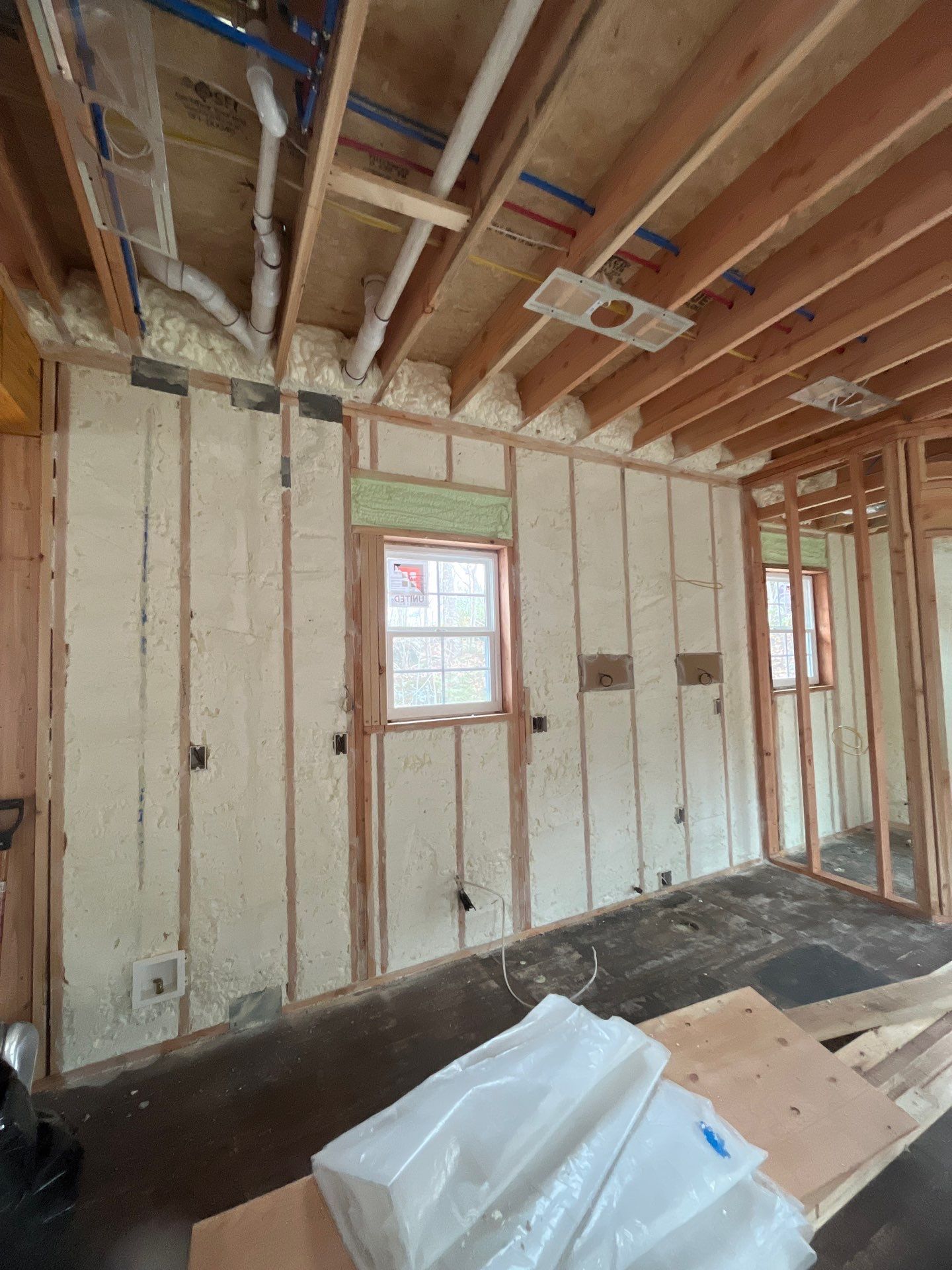 Basement Ceiling using Closed Cell Spray Foam by NYS Foam & Energy