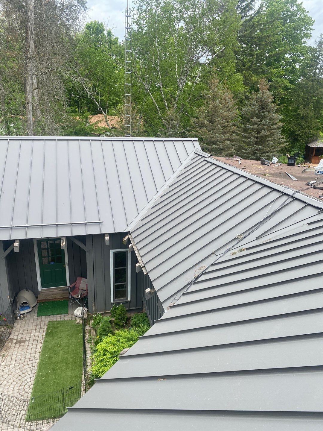 New Roof Installation using 16" Standing Seam Panels by Jay Carter Roofing & Sheet Metal