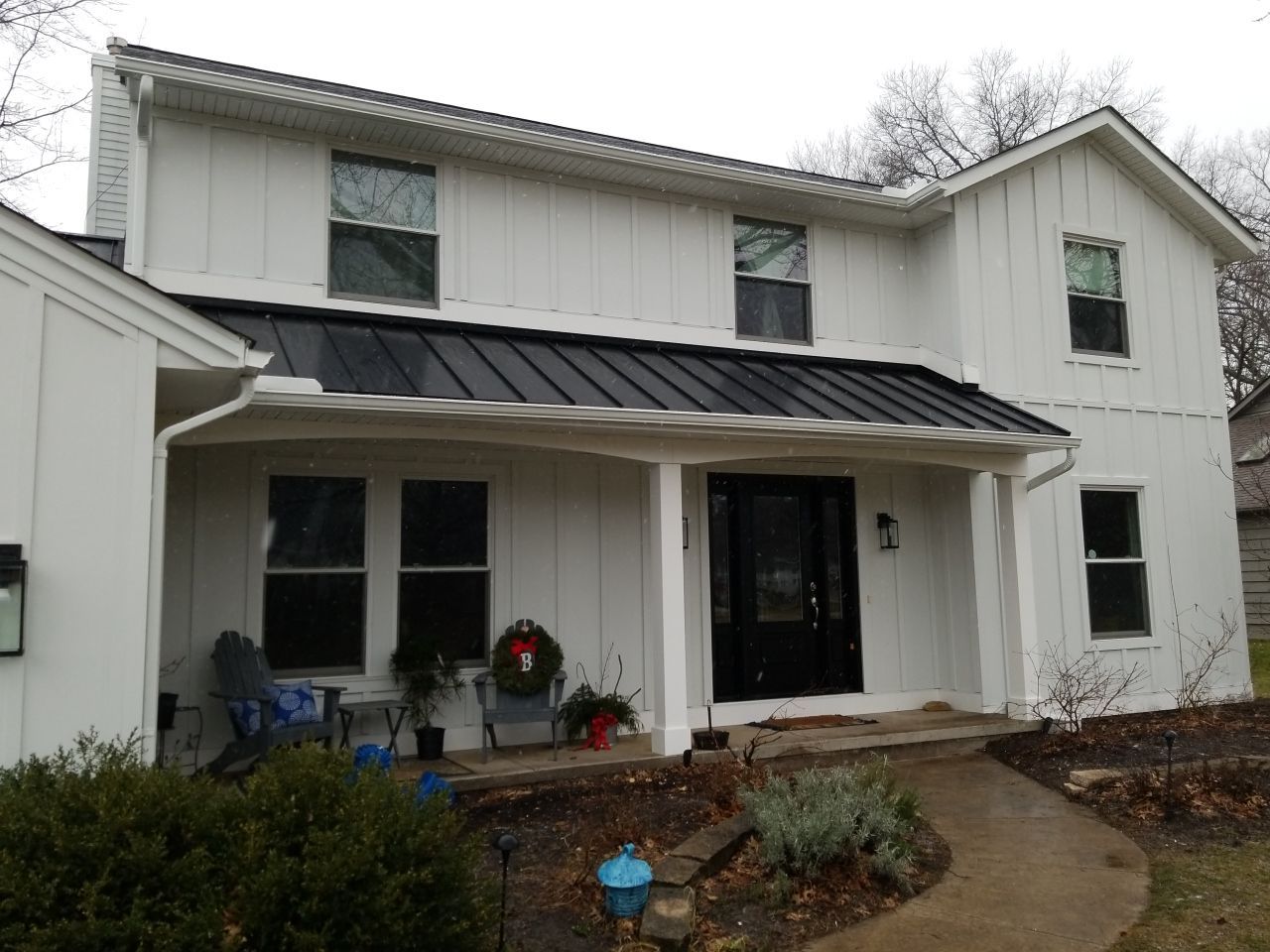 James Hardie Siding  using James Hardie Board and Batten, White by Absolute Roofing and Construction