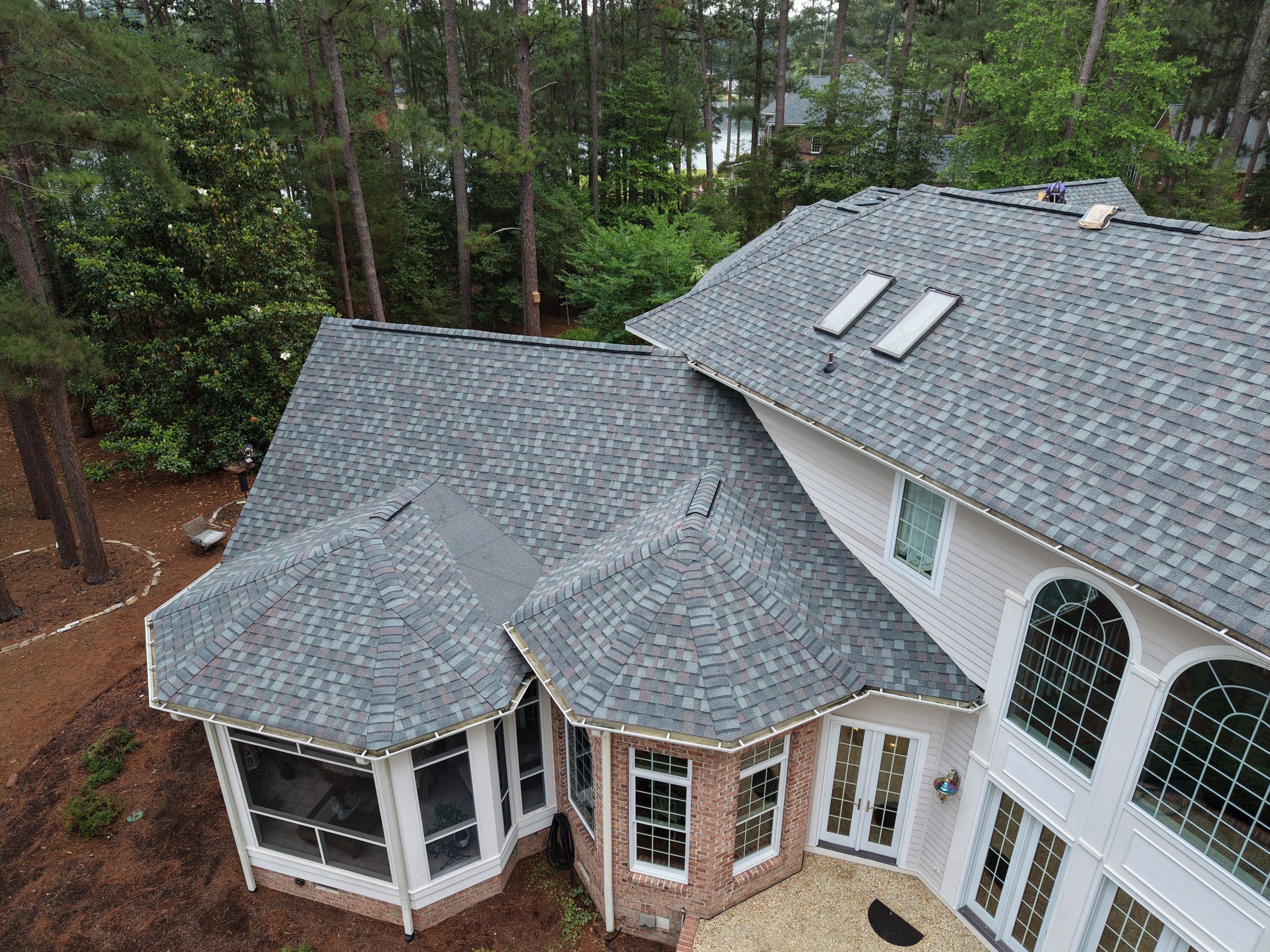 Architectural Shingle Roof Replacement and Skylight Upgrade in Pinehurst by Prepare The Way Roofing