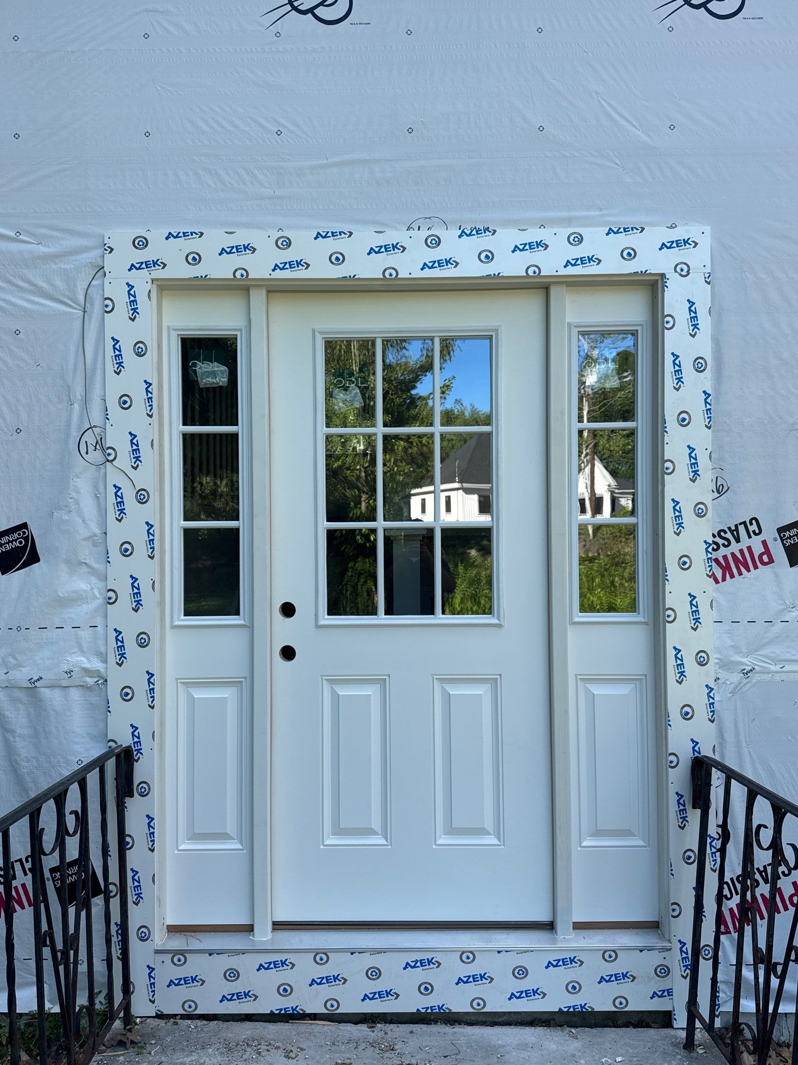 Full Siding Replacement in Newmarket, NH with CertainTeed Vinyl Siding and New Front Door Installation by Compass exteriors
