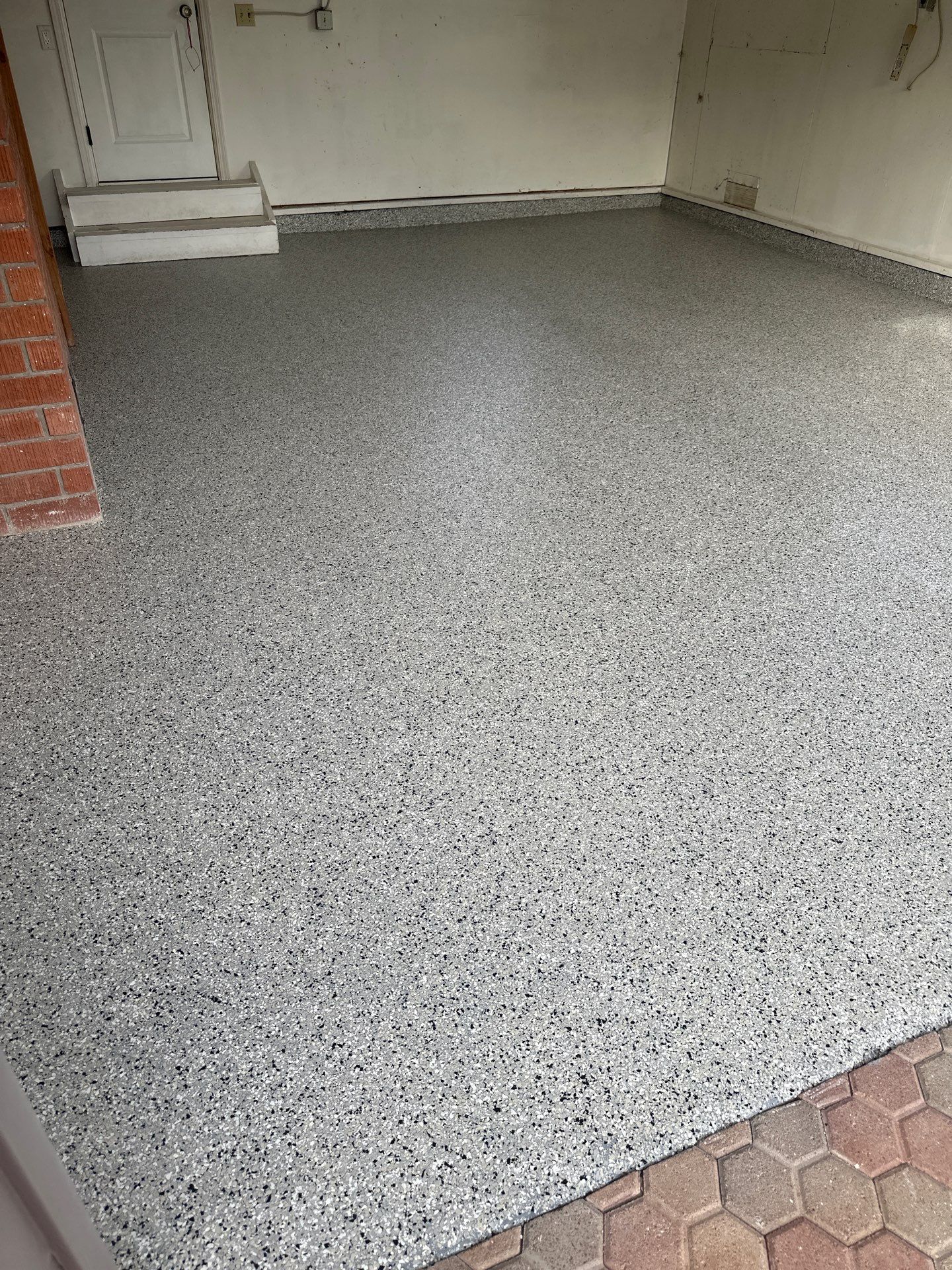Polyurea Garage Floor Coating with Cabin Fever Decorative Chips in Cambria by MGP Coatings
