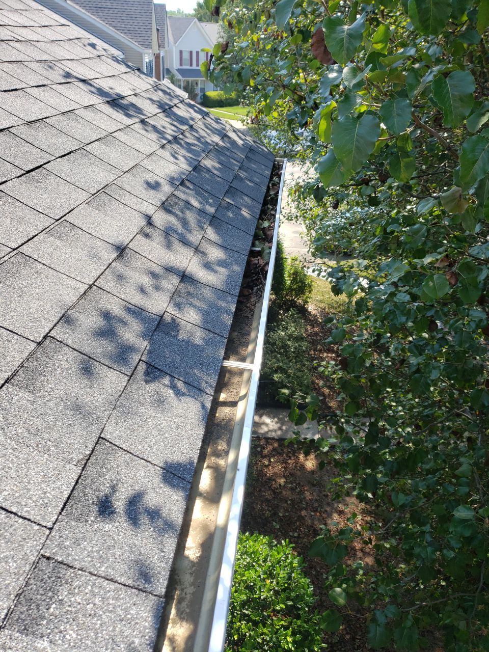 Gutter Cleaning using water by G&H Home Tech Pros LLC