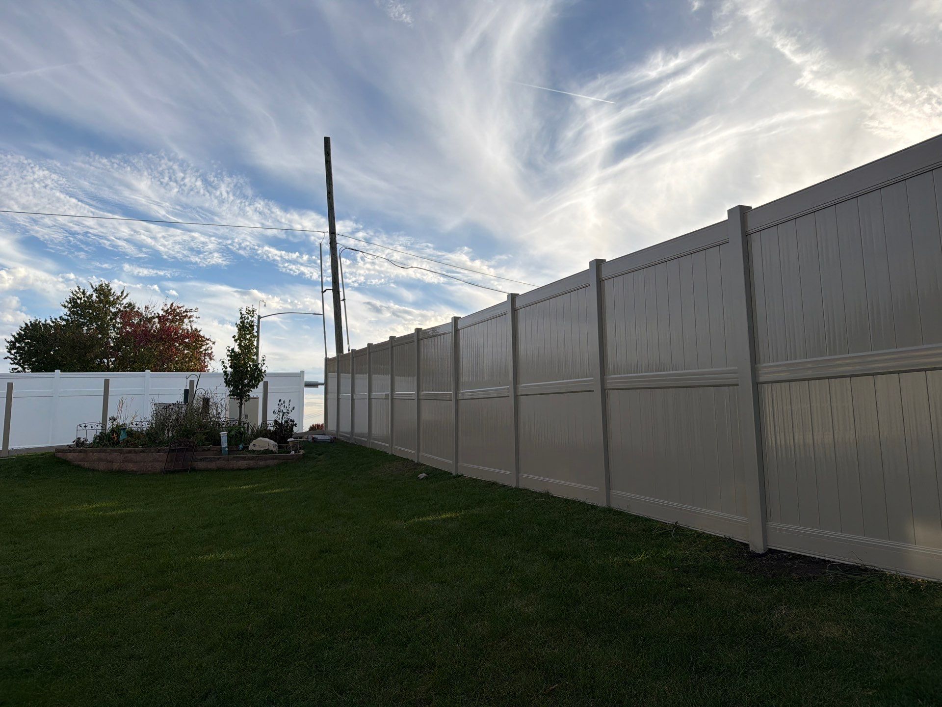 Adobe Vinyl Privacy Fence and Gate Installation in Cedar Falls by Perfect Picket Fence and Stain