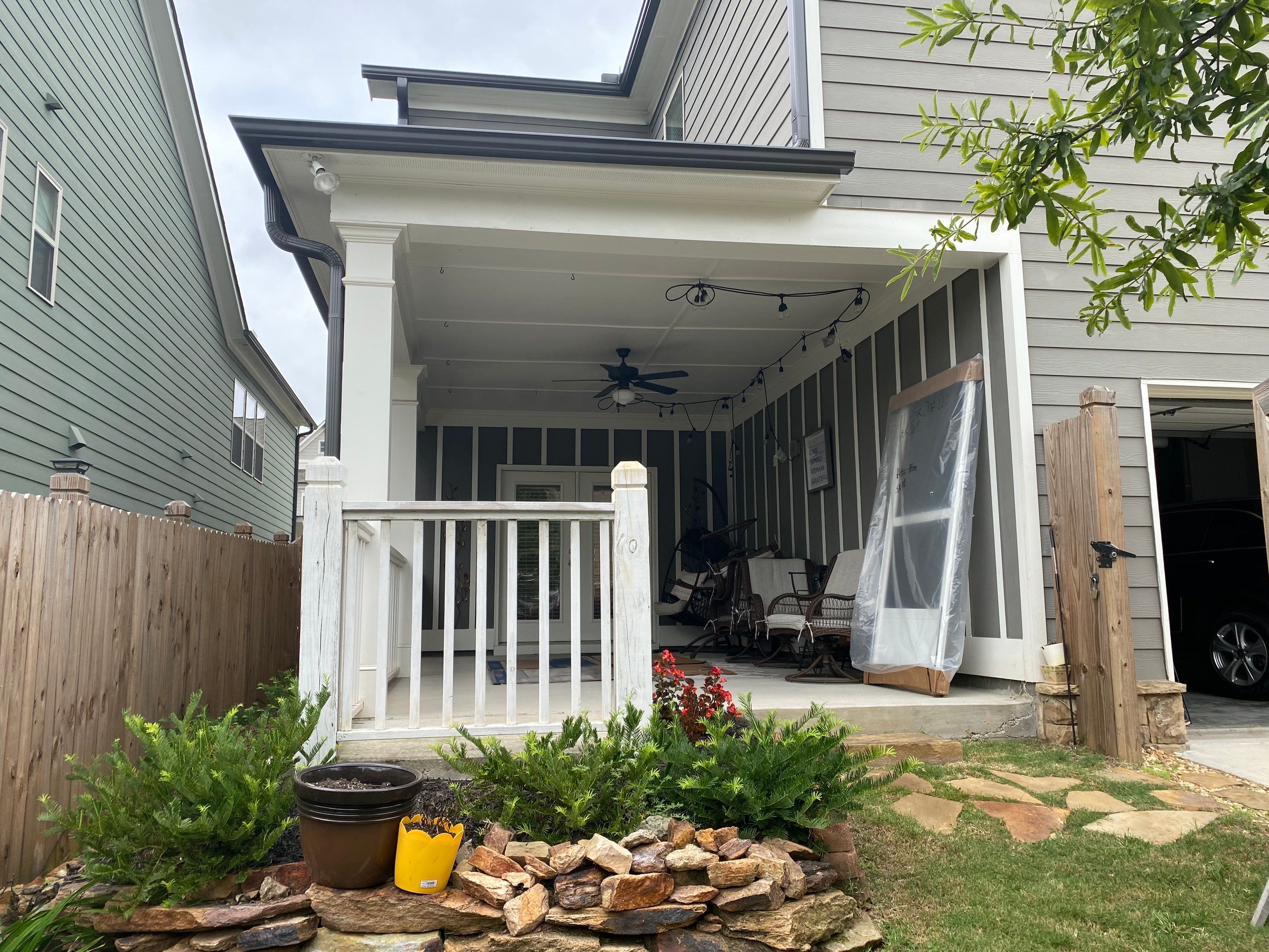 Custom Screened-In Porch Enclosure with White Railings in Smyrna by Swift Home Renovations
