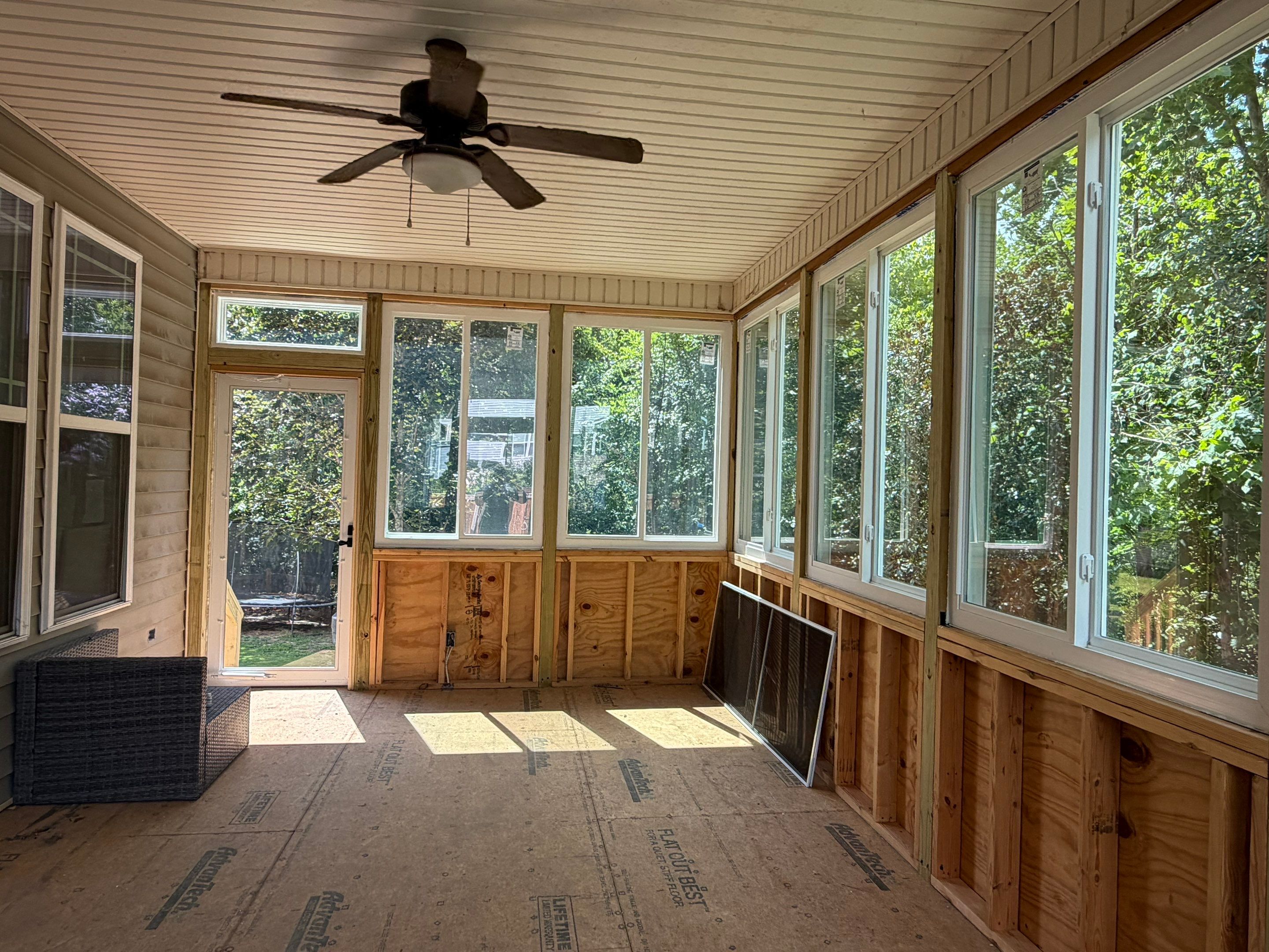 Custom Sunroom Conversion and Screened Porch Addition in Wake Forest by The Remodeling Company