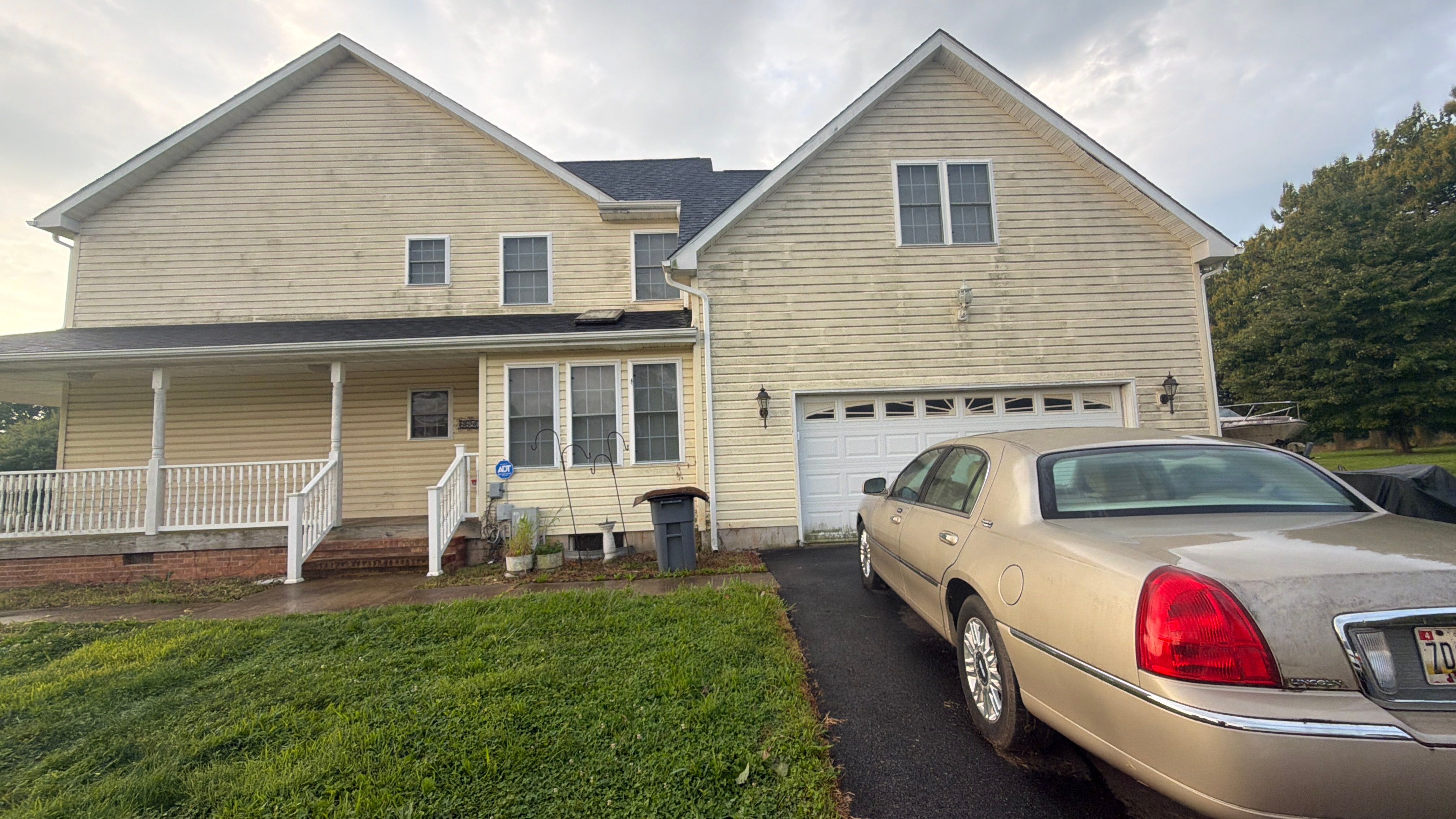 Vinyl Siding House Washing and Wood Deck Restoration in Carroll County by Baltimore Pressure Washers Inc.
