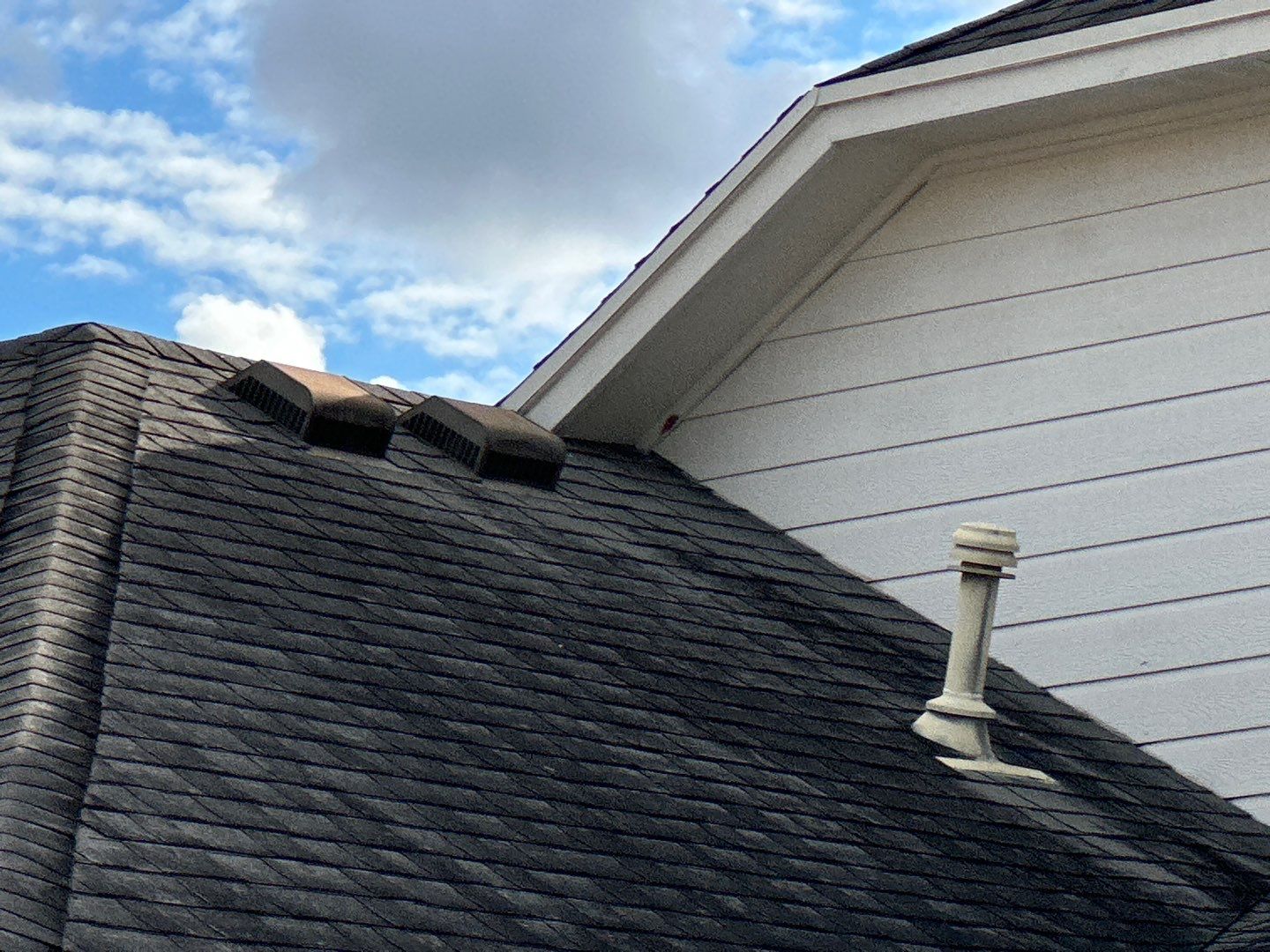 Residential Roofing Installation using Certainteed Landmark Moire Black by Galvan Roofing and Construction