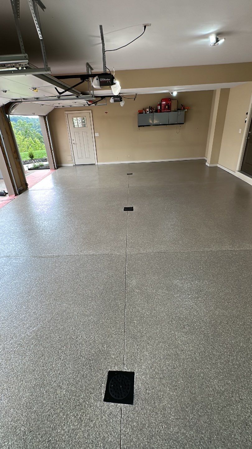 Large Patio + Garage Project in Moon Township by Floors in a Day, Inc