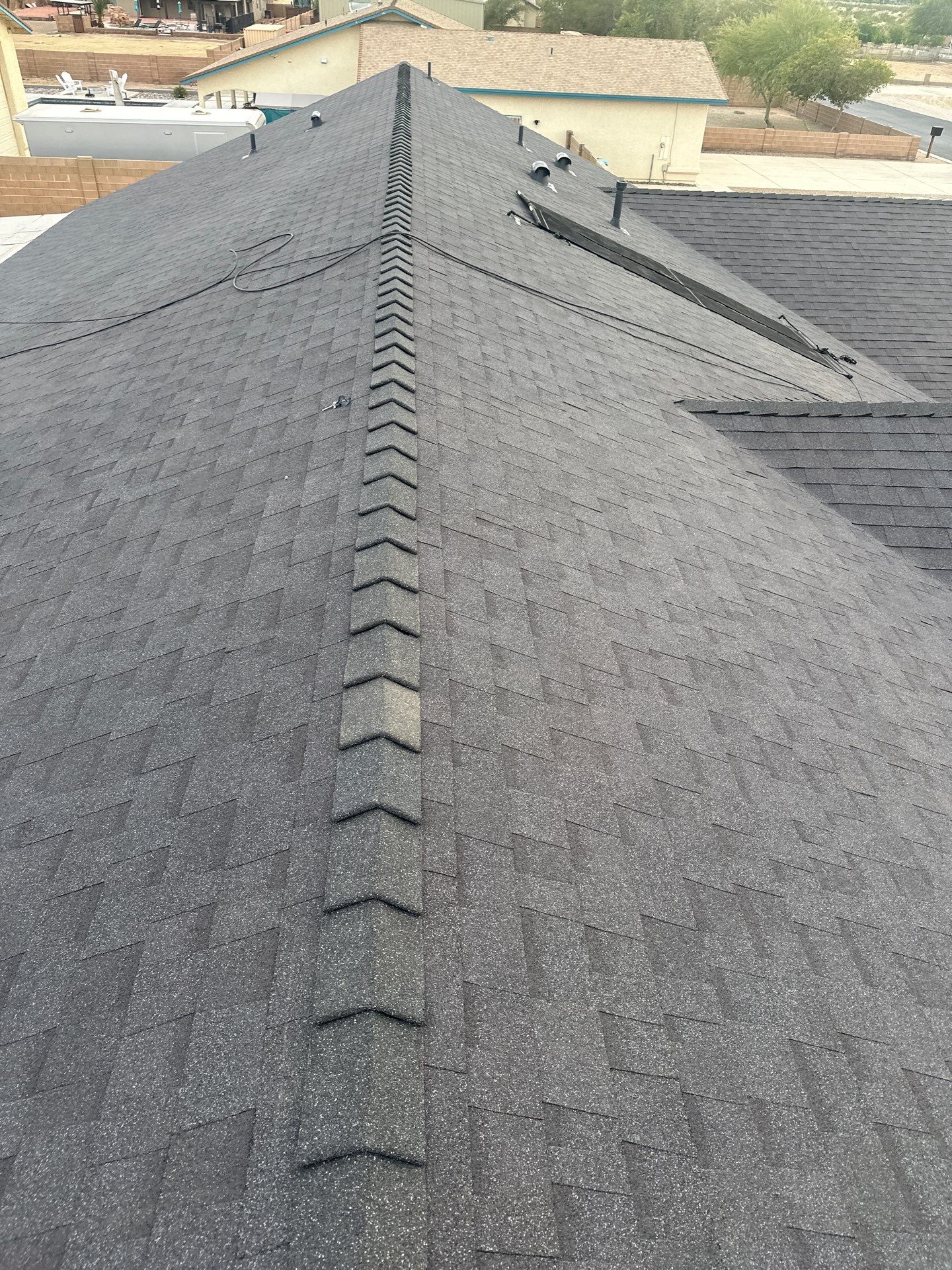 Storm Grey Shingles by Reimagine Roofing