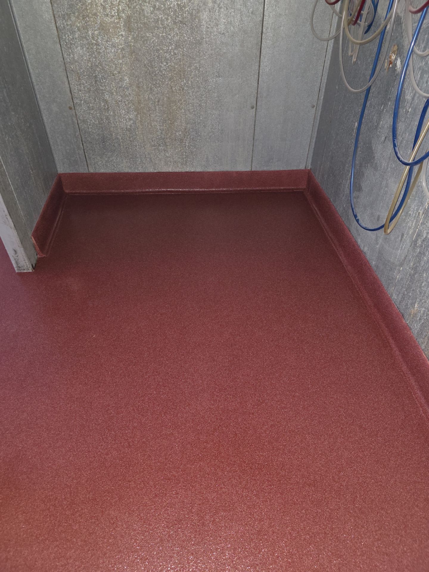Industrial Red Quartz Polyurea Floor Installation for Atascadero Brewery by MGP Coatings