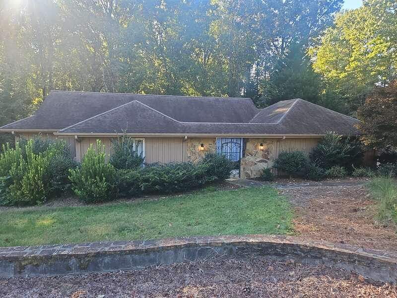 Siding, Gutter, and Replacement with Exterior Painting on 1974 Built Home in Roswell, GA by Nelson Exteriors 