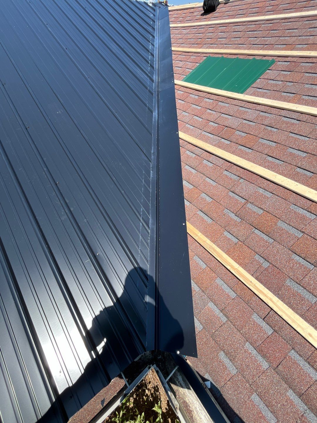 Residential Roofing Installation using Perfromance Panel Metal - Black by RoofX 