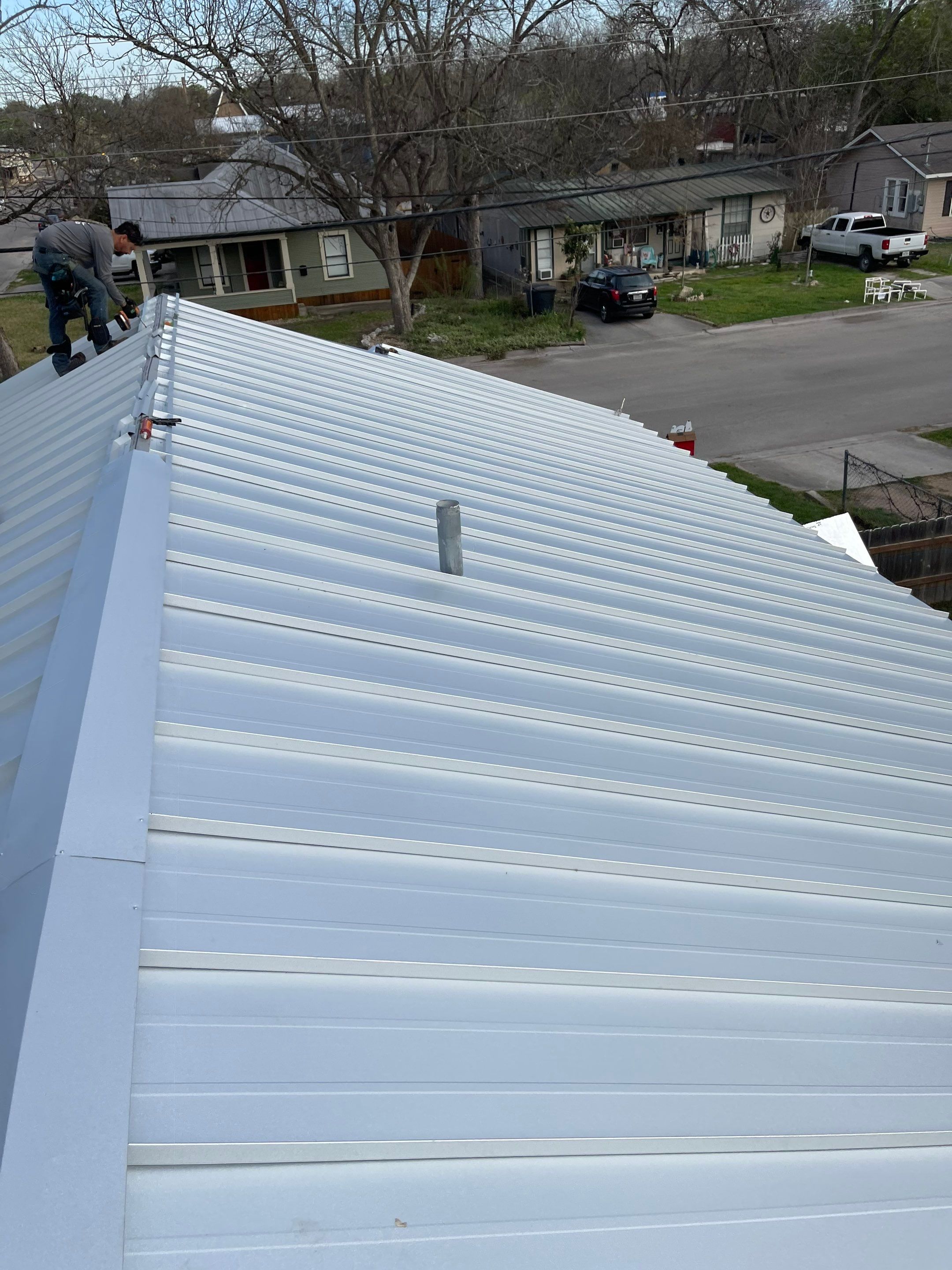 Residential Metal Roof Installation using McElroy Metal by Premier Roofing and Contracting