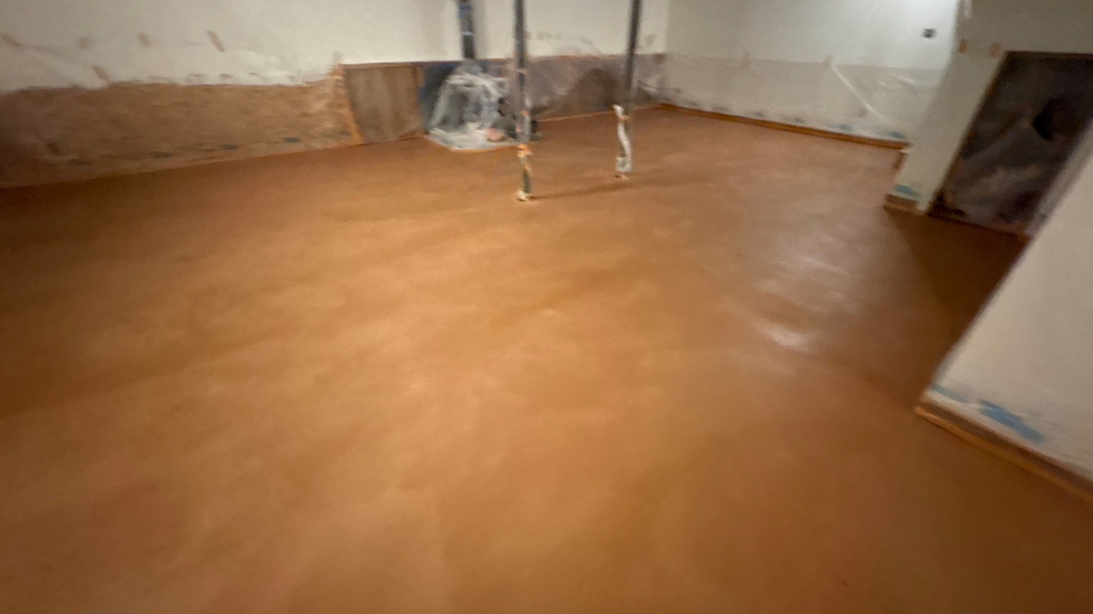 Basement Floor Remodel with Haven Reno KC by Big Red Decorative Concrete, LLC