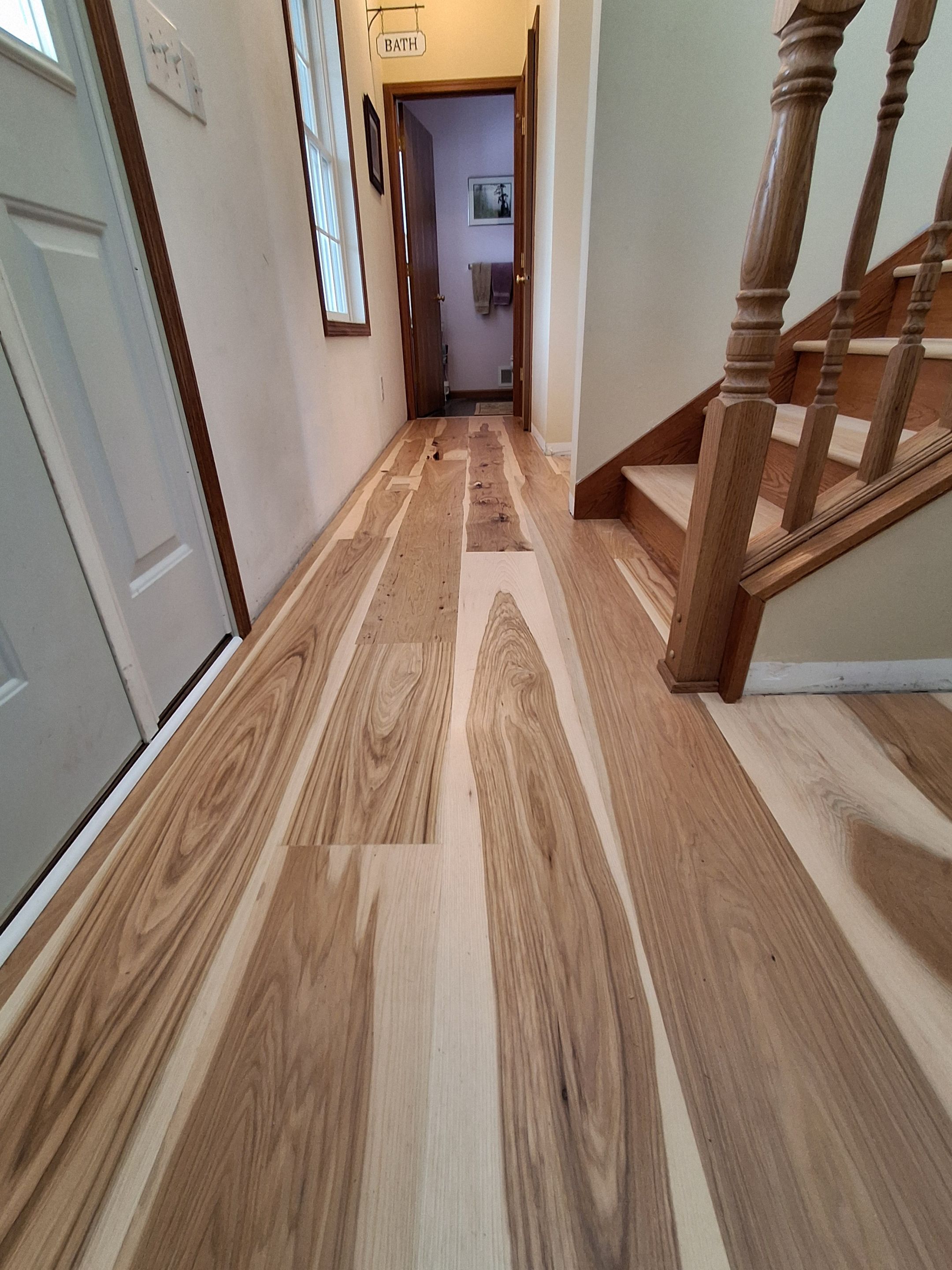 Wide plank natural calico hickory by Ann Arbor Hardwoods 