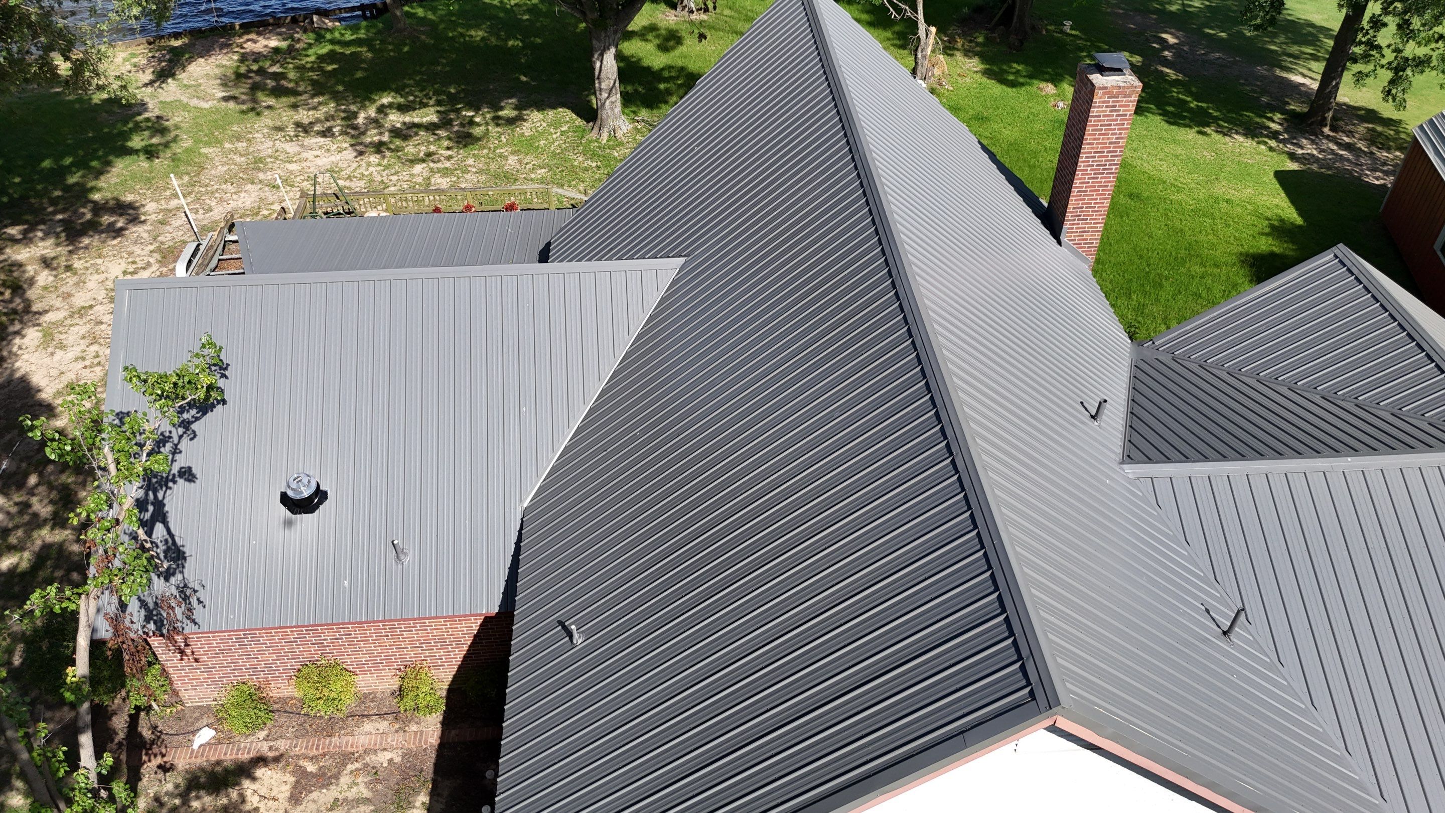 Charcoal Metal Roof at Lake Limestone, Tx by DT Roofing - Seth Wells