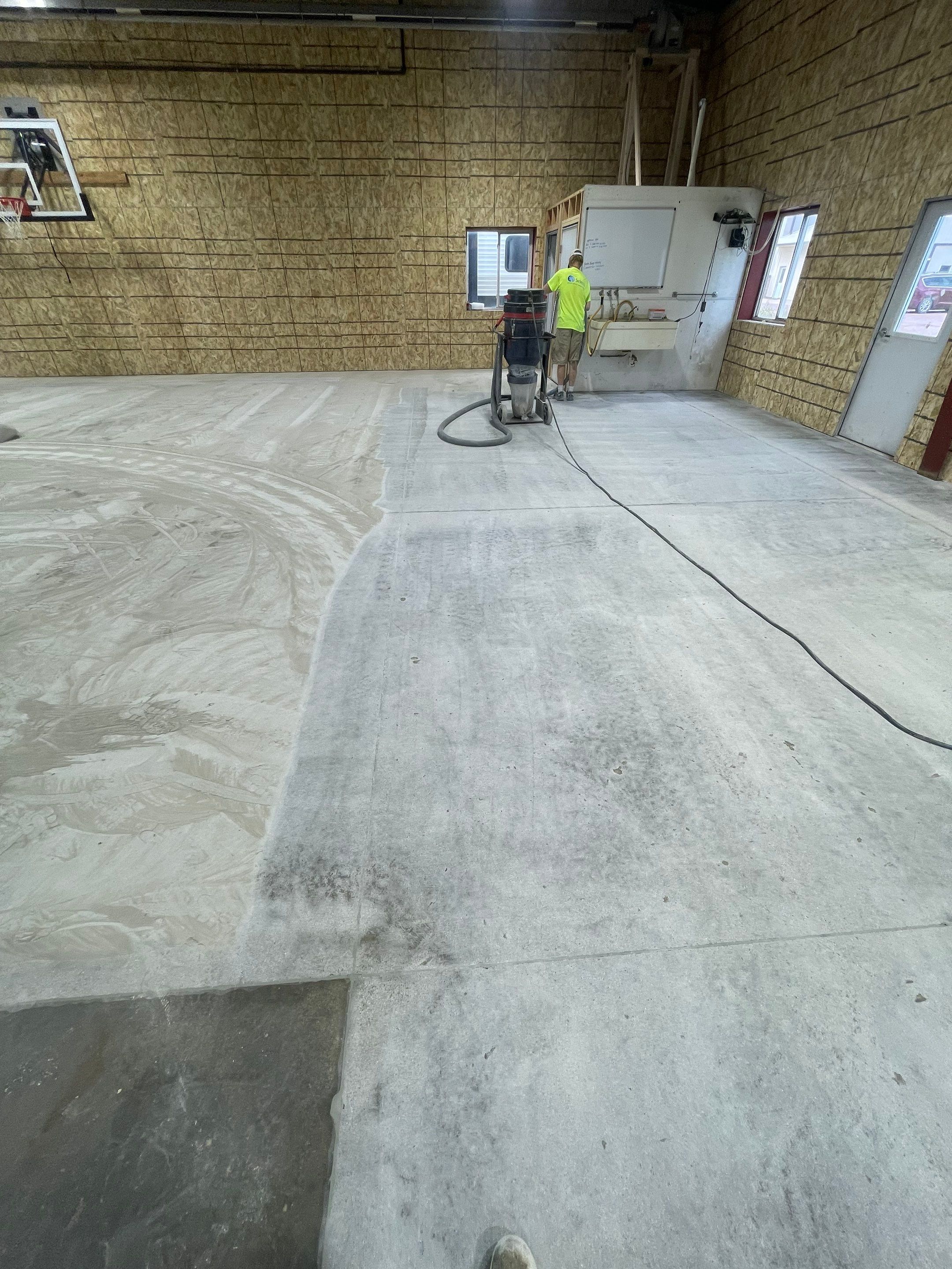 Custom Polyurea Shop Floor with Basketball Court Lines in Rock Valley by Select Painting, Coatings & Garage Cabinets