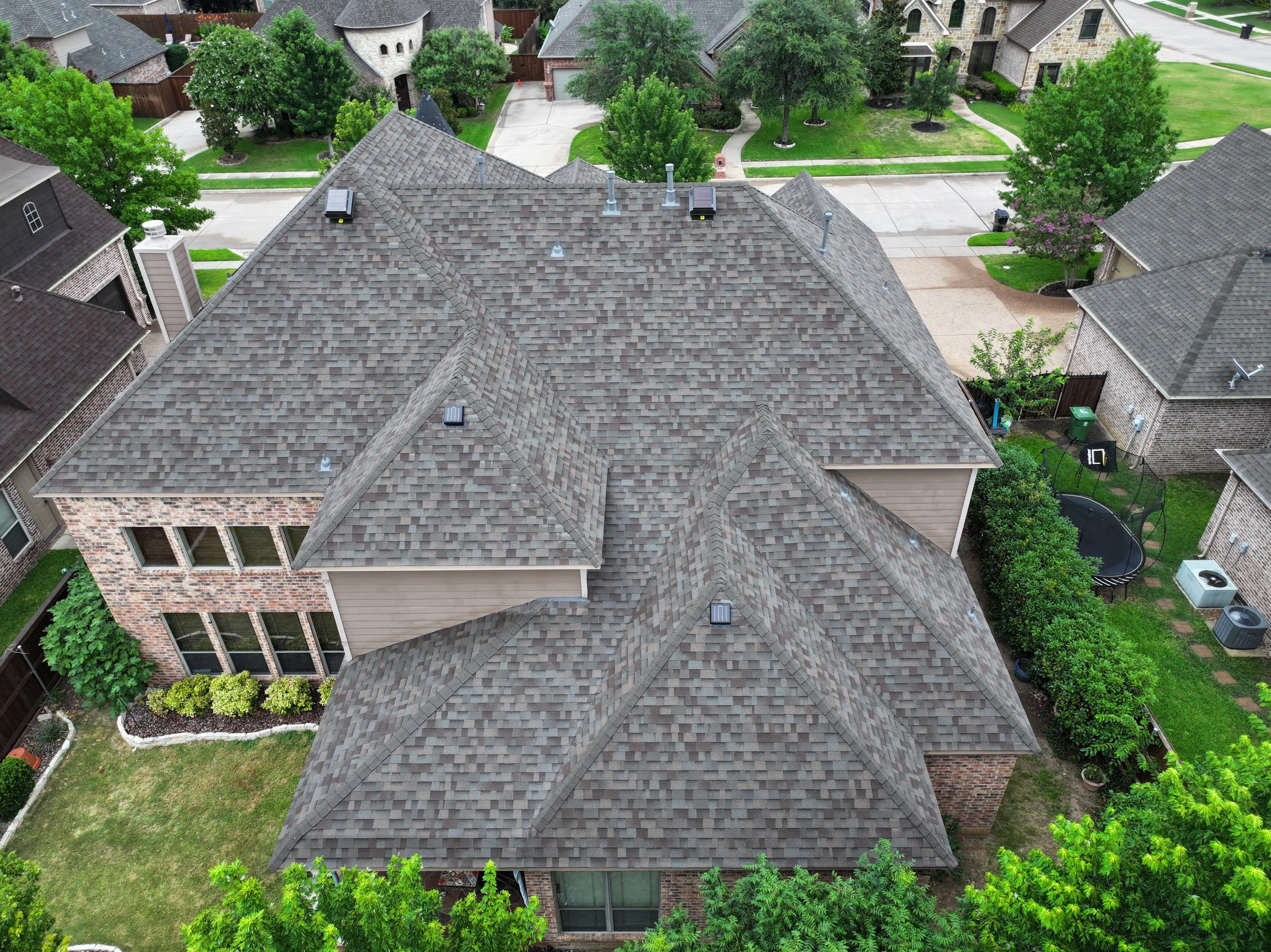 Installing Custom copper turret and Malarkey Vista Class 4 shingles Hail Damage Upgrade by Becker Roofing and Exteriors