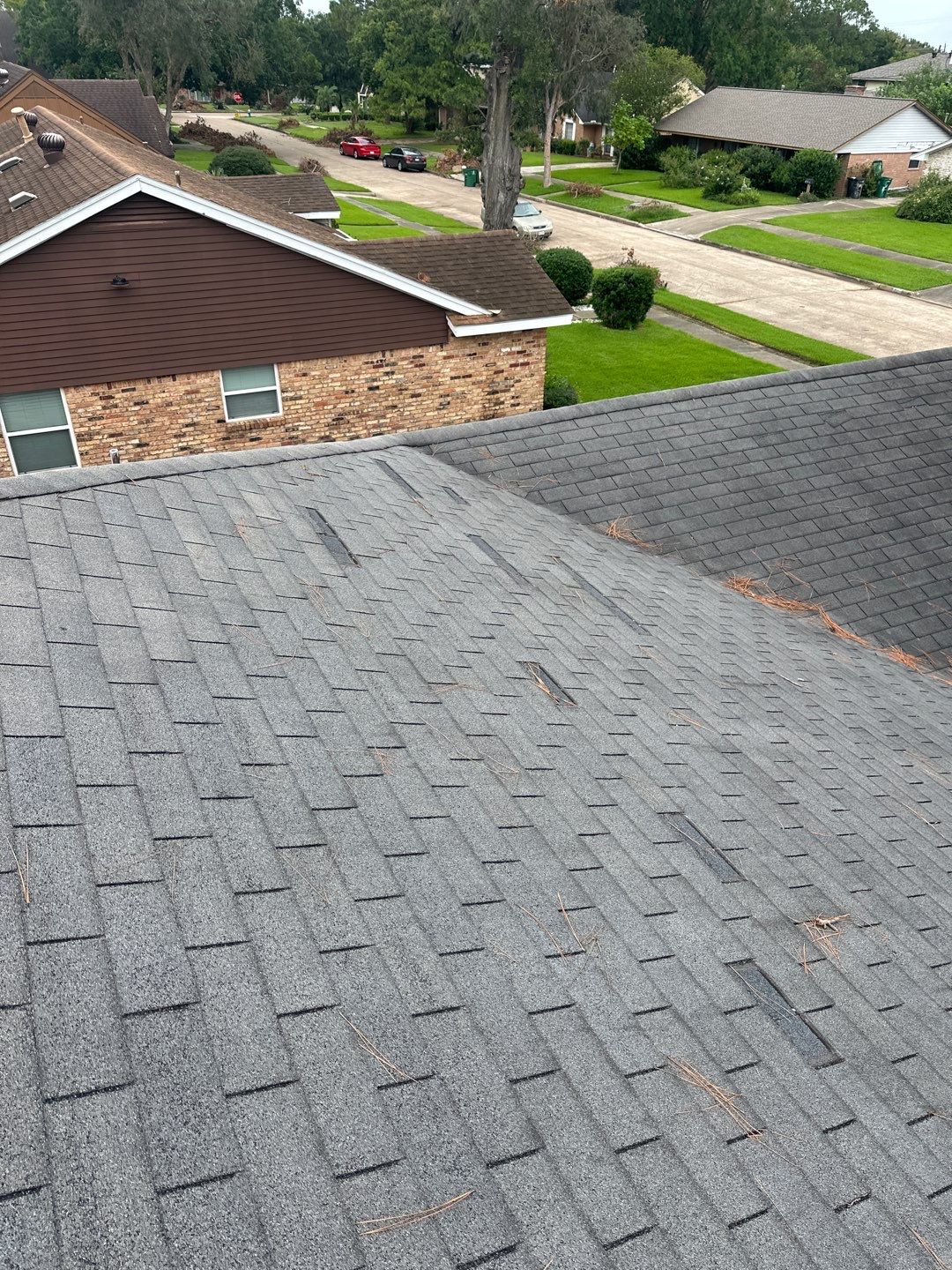 Hail Damage using Owen's Corning Duration (Lifetime) Shingles by Roof Repair Company