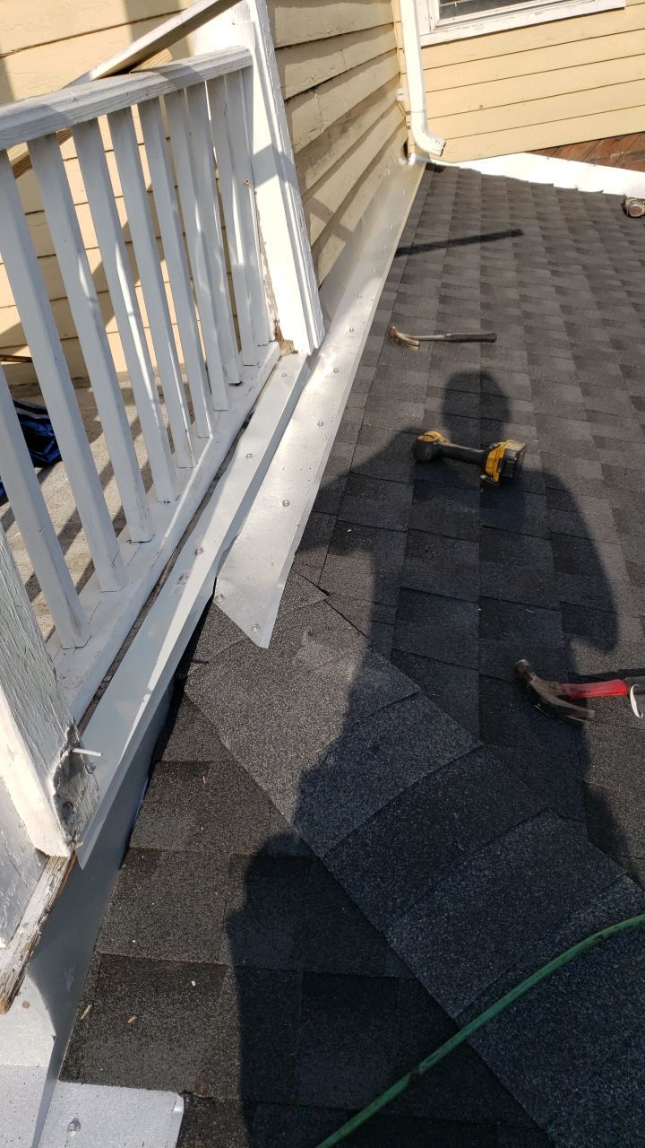 Residential Roofing Installation using Roof Replacement by American Roofing & Construction LLC