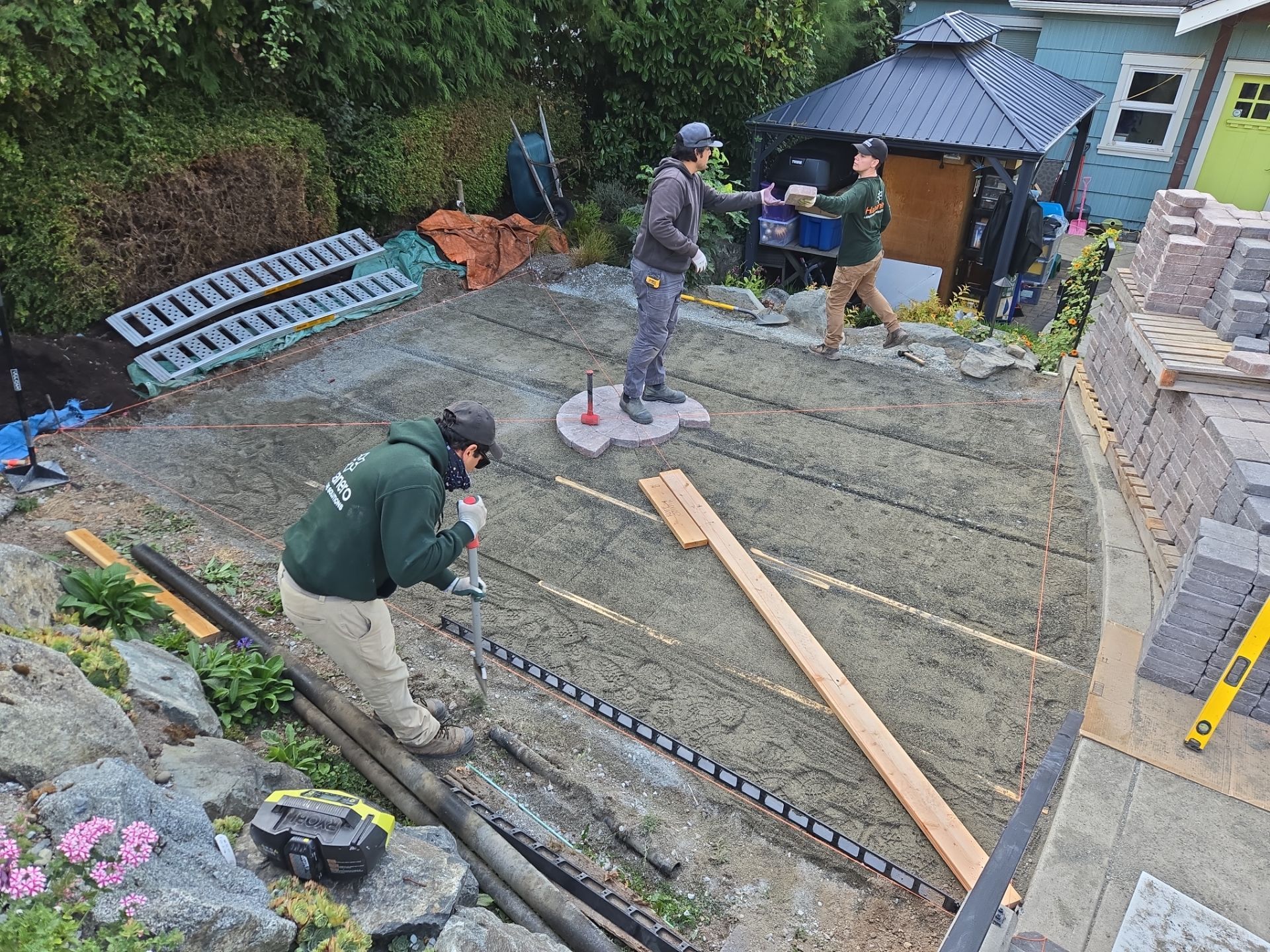 Backyard Transformation — Custom Shed, Paver Patio & Retaining Wall by Habanero Garden and Exterior Care