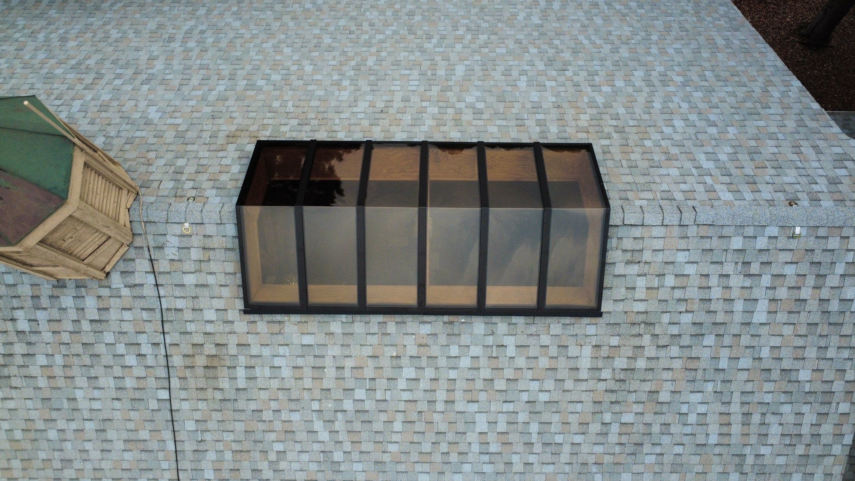 Asphalt Shingle and Skylight Replacement Project in Denver, CO by Blue Peaks Roofing LLC 