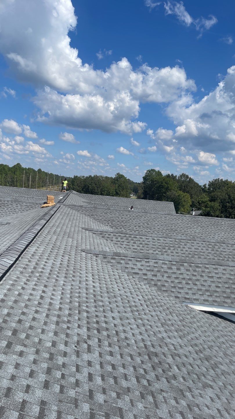 Commercial Roofing Installation using Roof Replacement by American Roofing & Construction LLC
