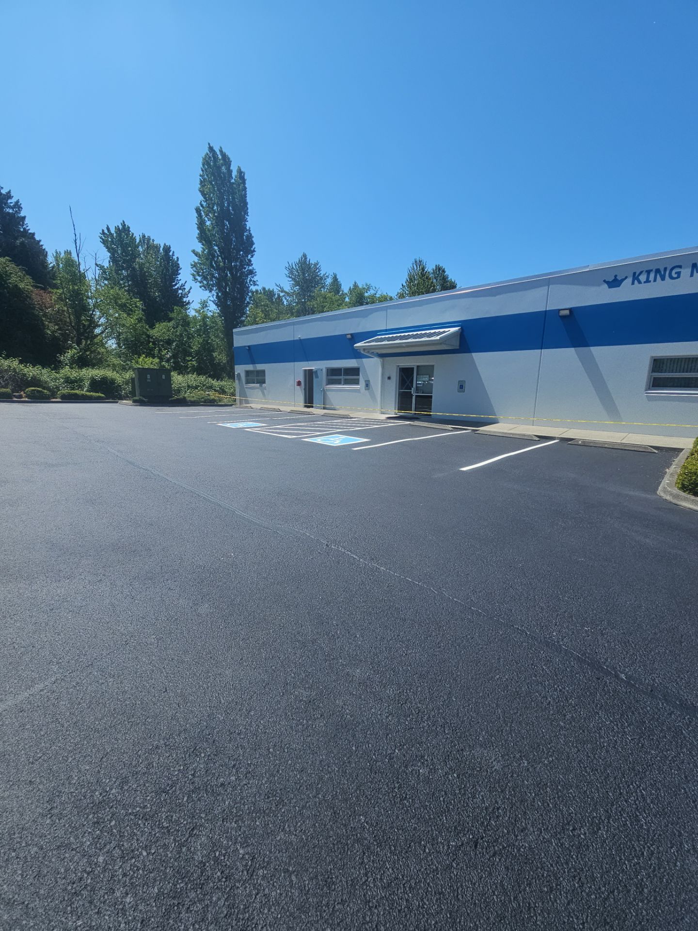 King Machine Business Parking Lot Sealcoat Overlay | Mukilteo by Jireh Asphalt & Concrete Inc 