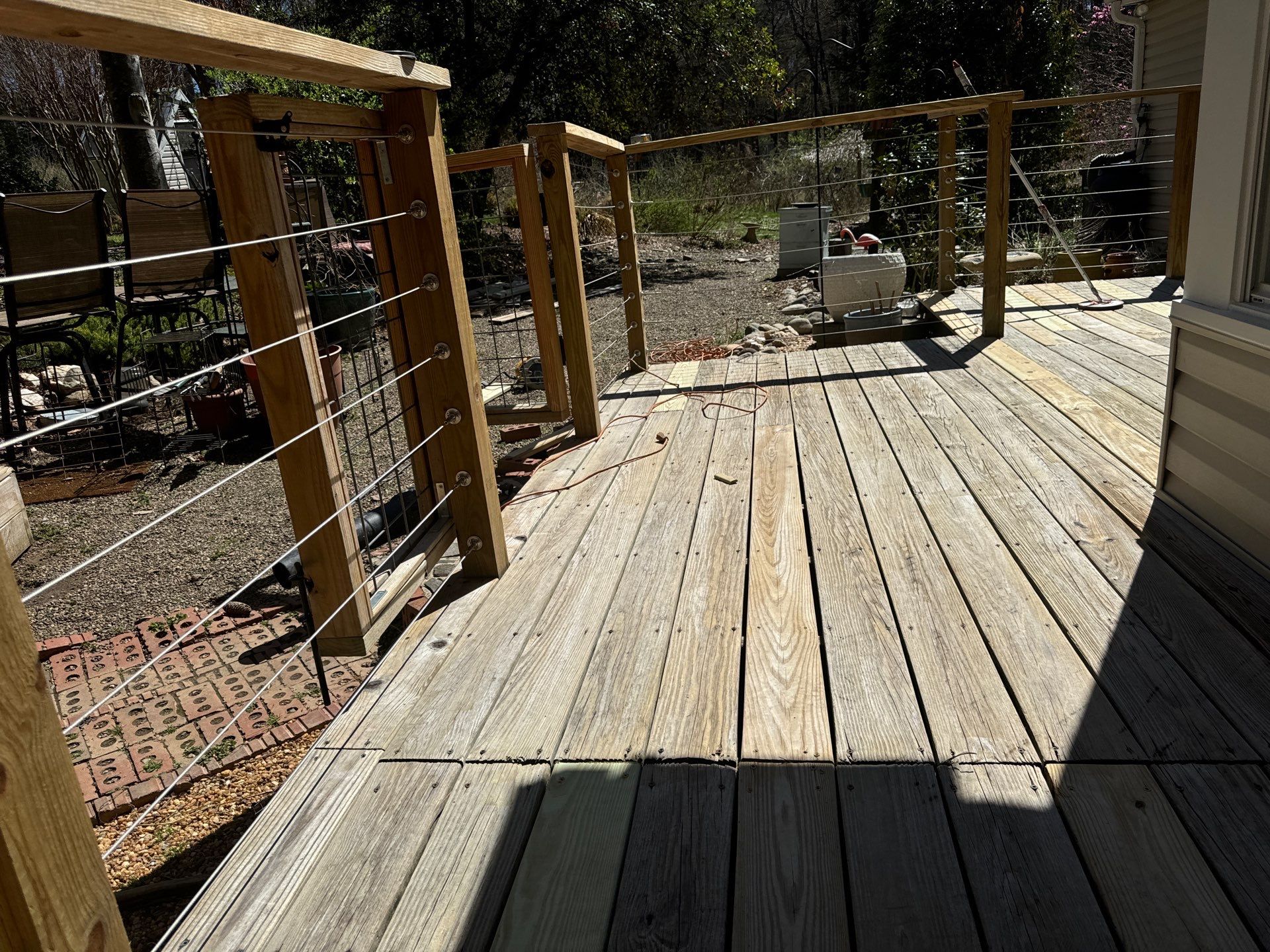 Deck staining by GonzalezPainters & Contractors Inc 