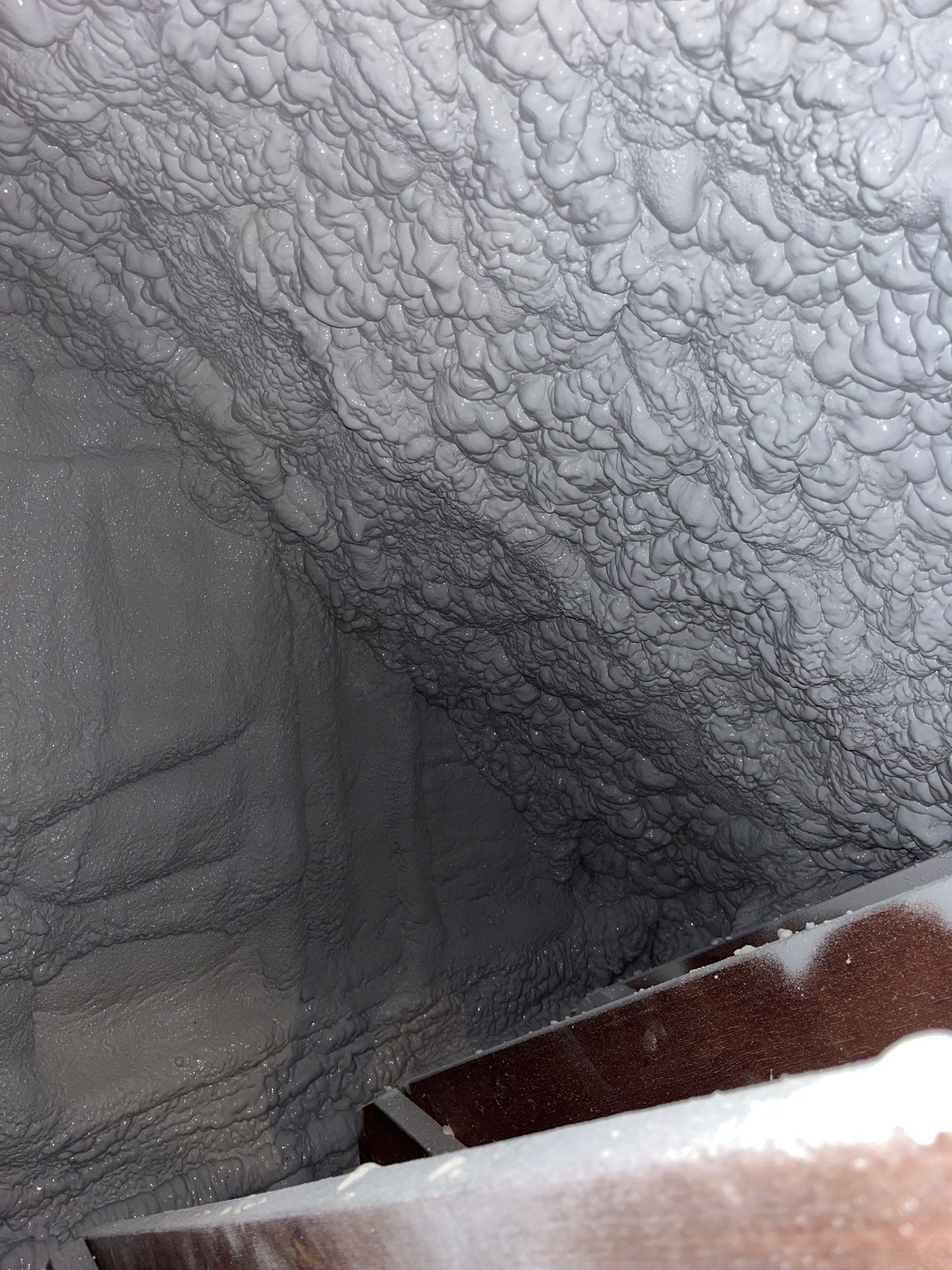 Attic Retrofit using open cell spray foam by NYS Foam & Energy