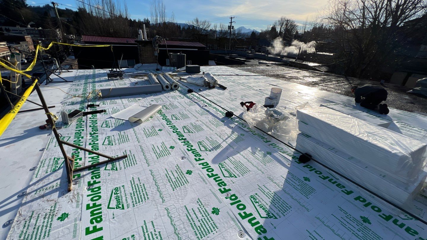 Residential ReRoofing Installation using Durolast by Top Notch Roofing Inc