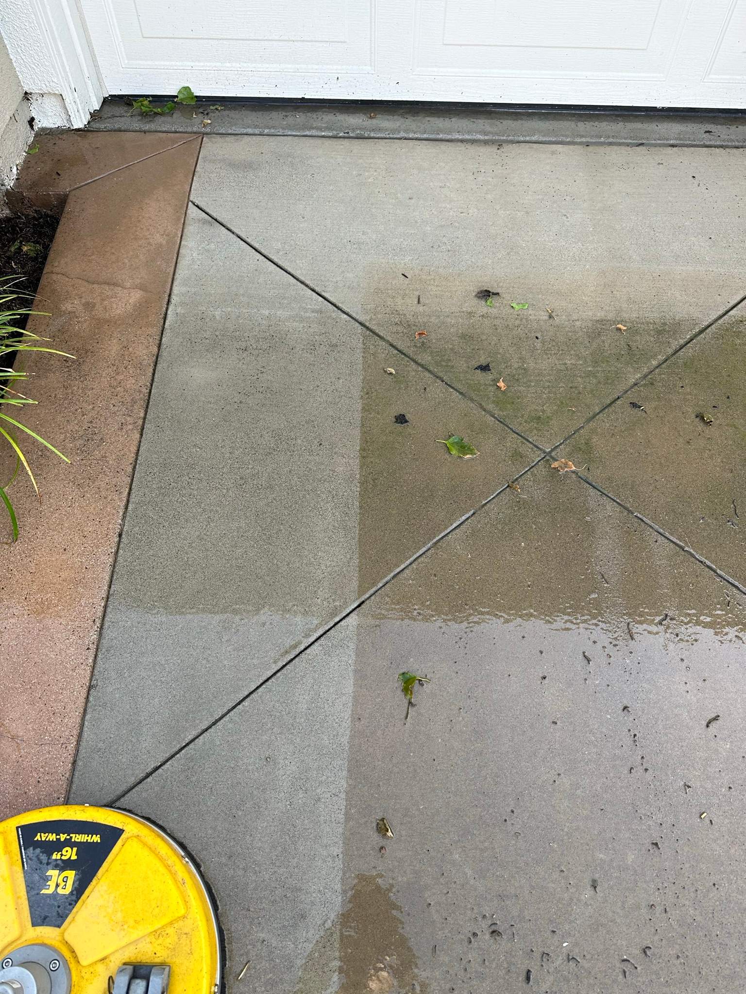 Roof wash on this dirty roof covered in algae by Property Cleaning Experts, LLC