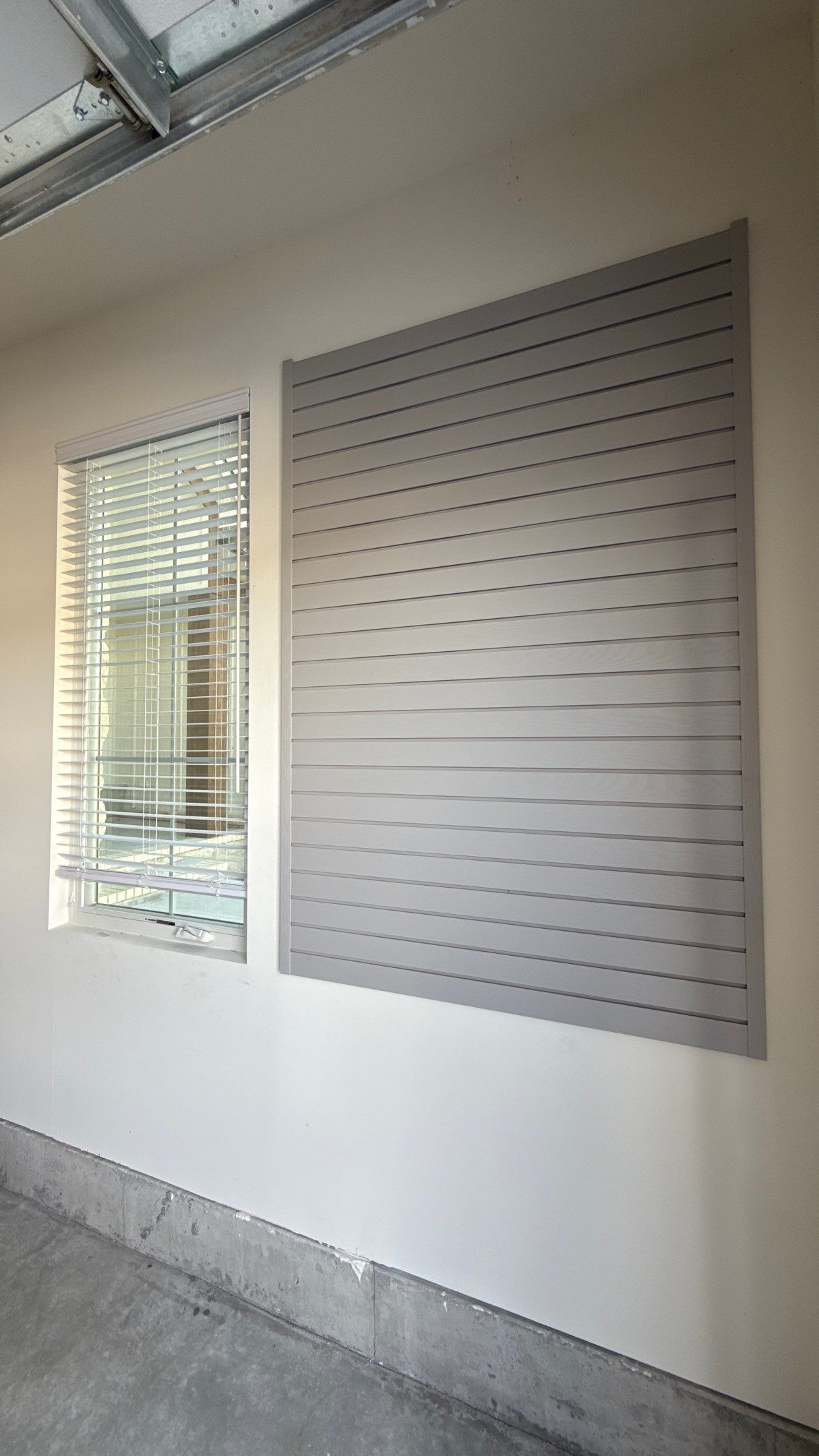 MKE Textured Grey Slatwall Creates A Perfect Storage Start  by Banner Garage