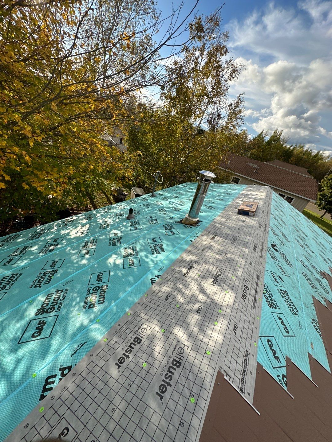 Residential Roofing Installation using Wakefield Bridge Steel Shingle by Ideal Steel by Artisan Roofing & Home Improvements Inc.